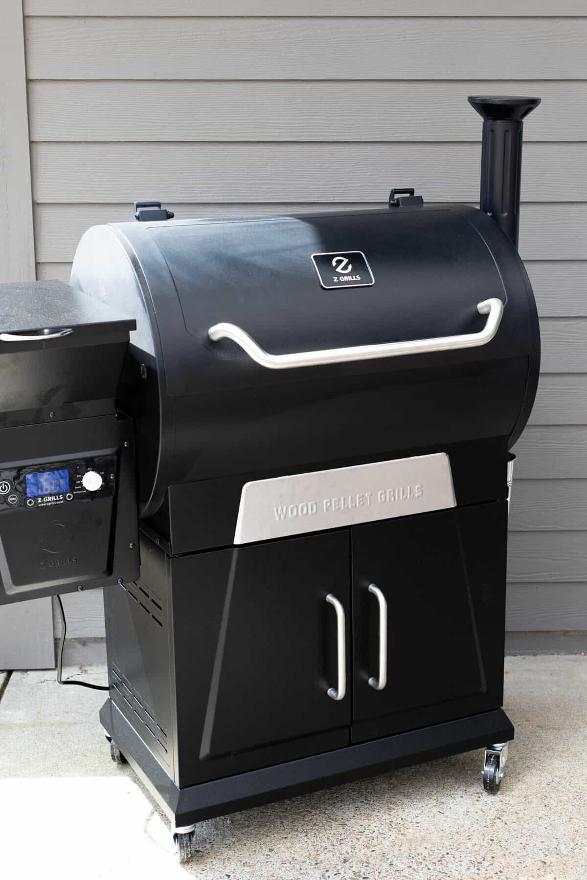 Z Grills wood pellet smoker on an outdoor patio.