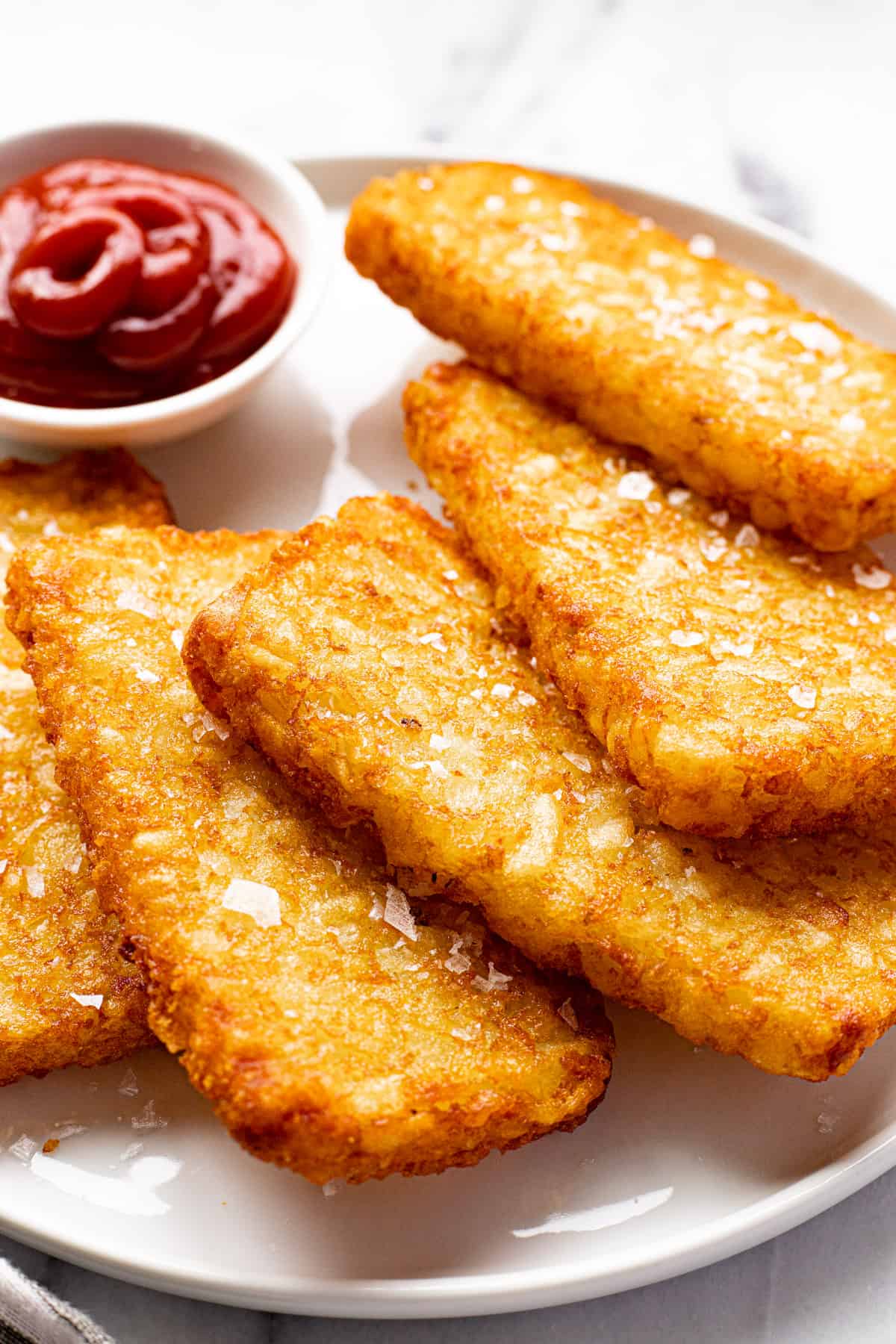 https://midwestfoodieblog.com/wp-content/uploads/2022/08/FINAL-air-fryer-hash-browns-3.jpg