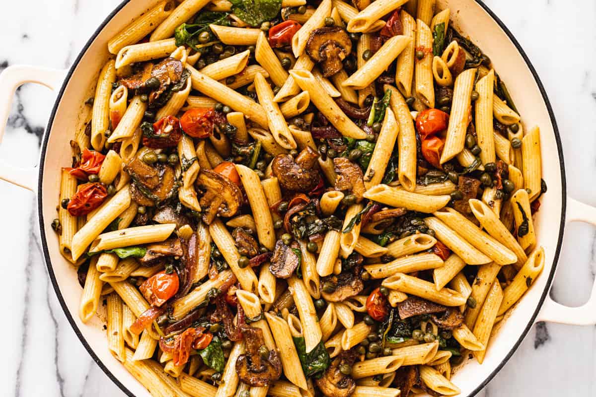 Large white pan filled with vegetable pasta fresca.