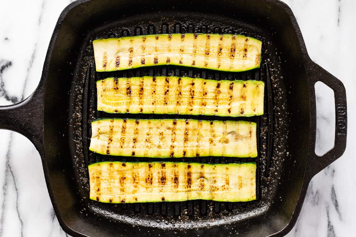 Grilled zucchini in a cast iron grill pan. 