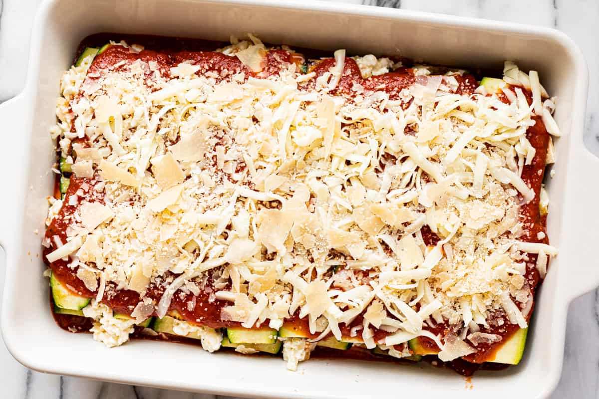 Step by step photos showing how to make homemade zucchini lasagna.