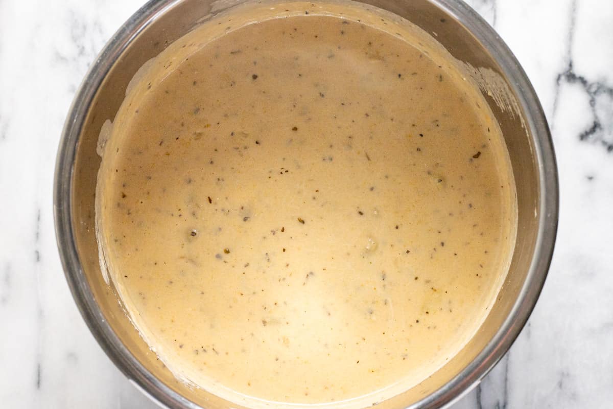 Instant pot insert filled with creamy homemade potato soup. 