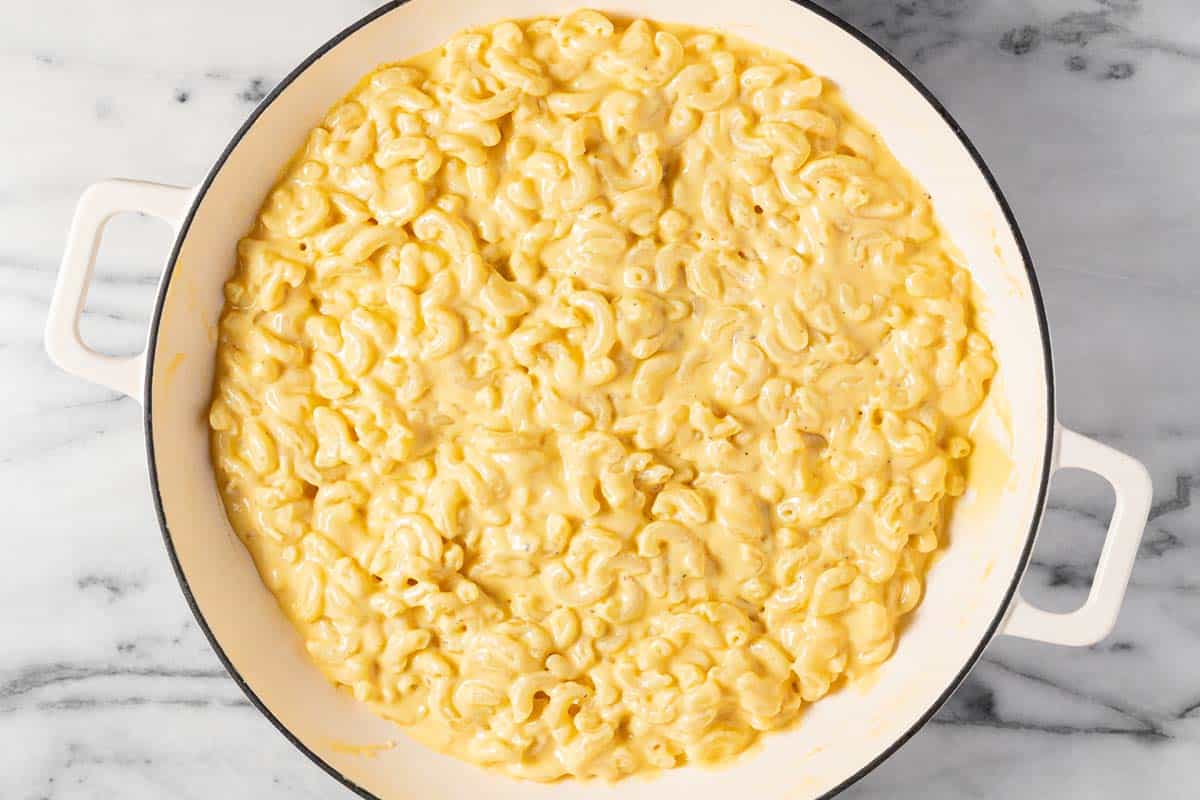 Large pan filled with creamy homemade macaroni and cheese. 