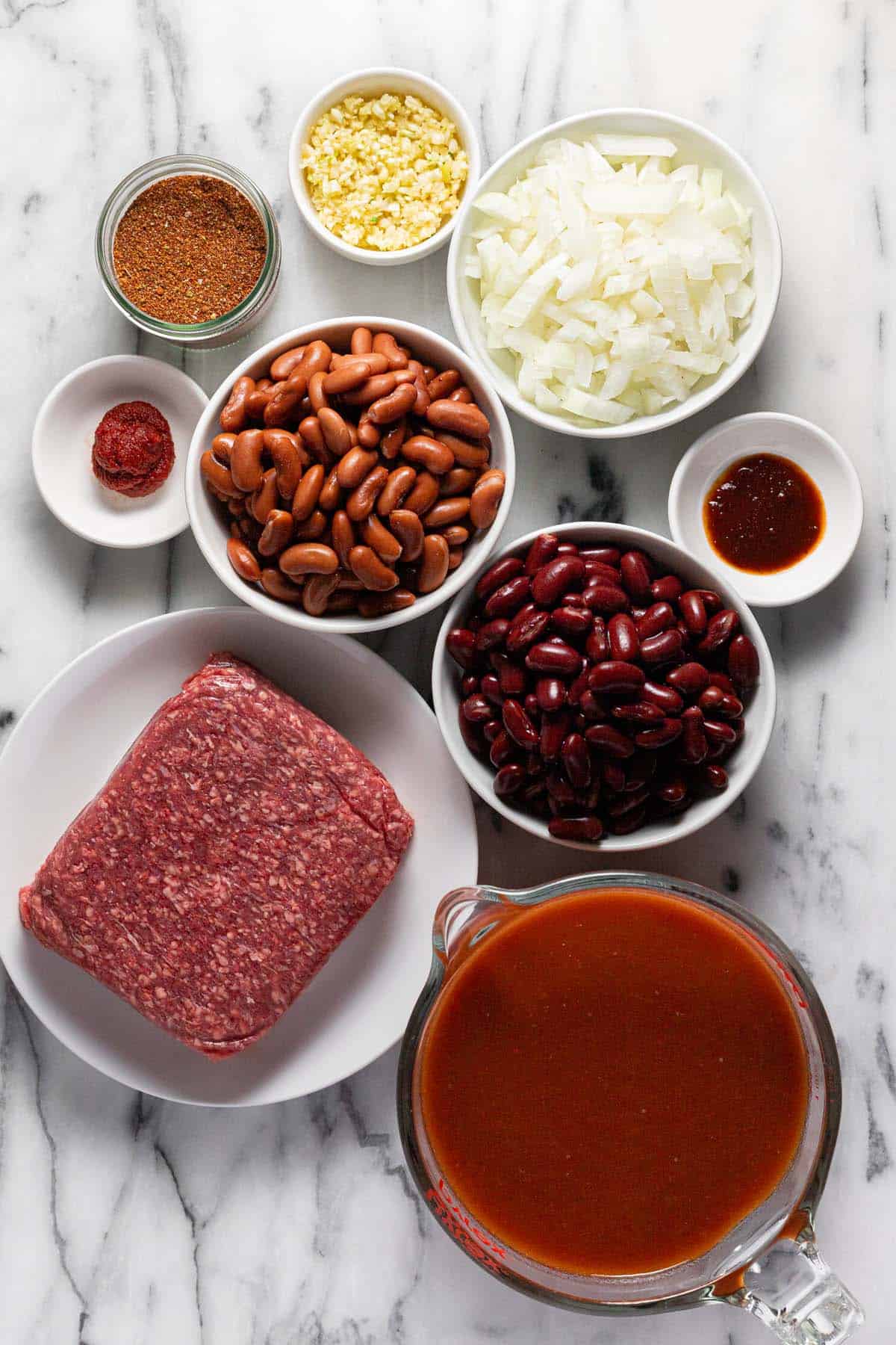 Bowls of ingredients to make homemade easy chili recipe. 