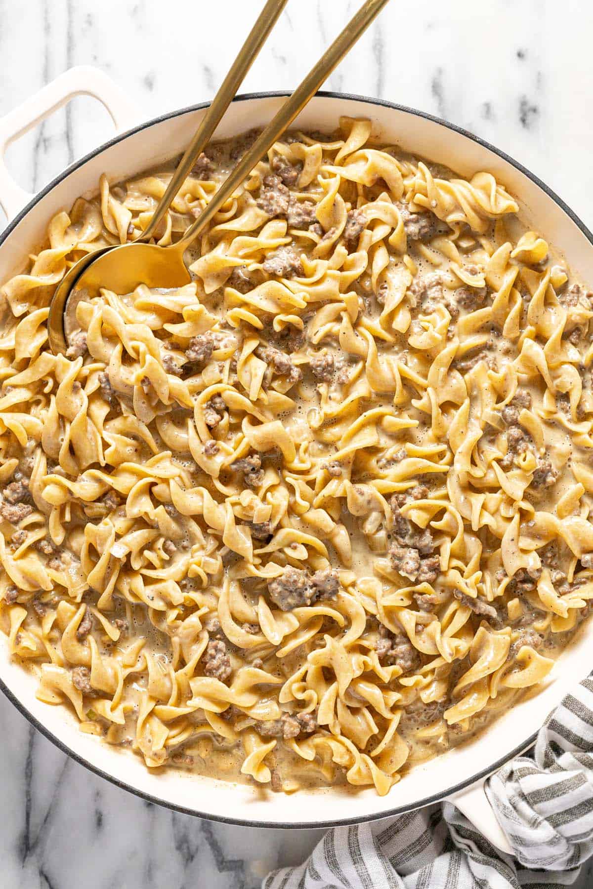 Large pan filled with creamy beef and noodles recipe.