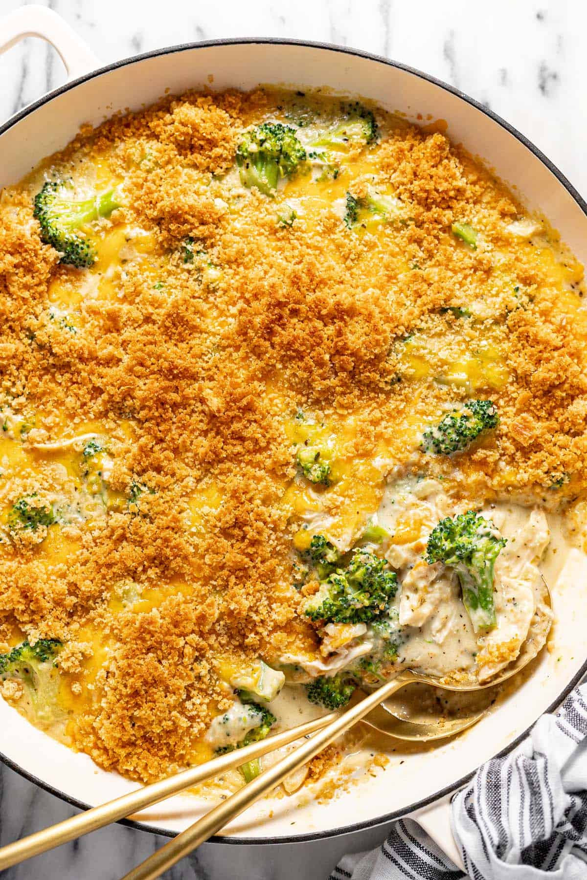 Large pan filled with homemade creamy chicken divan. 