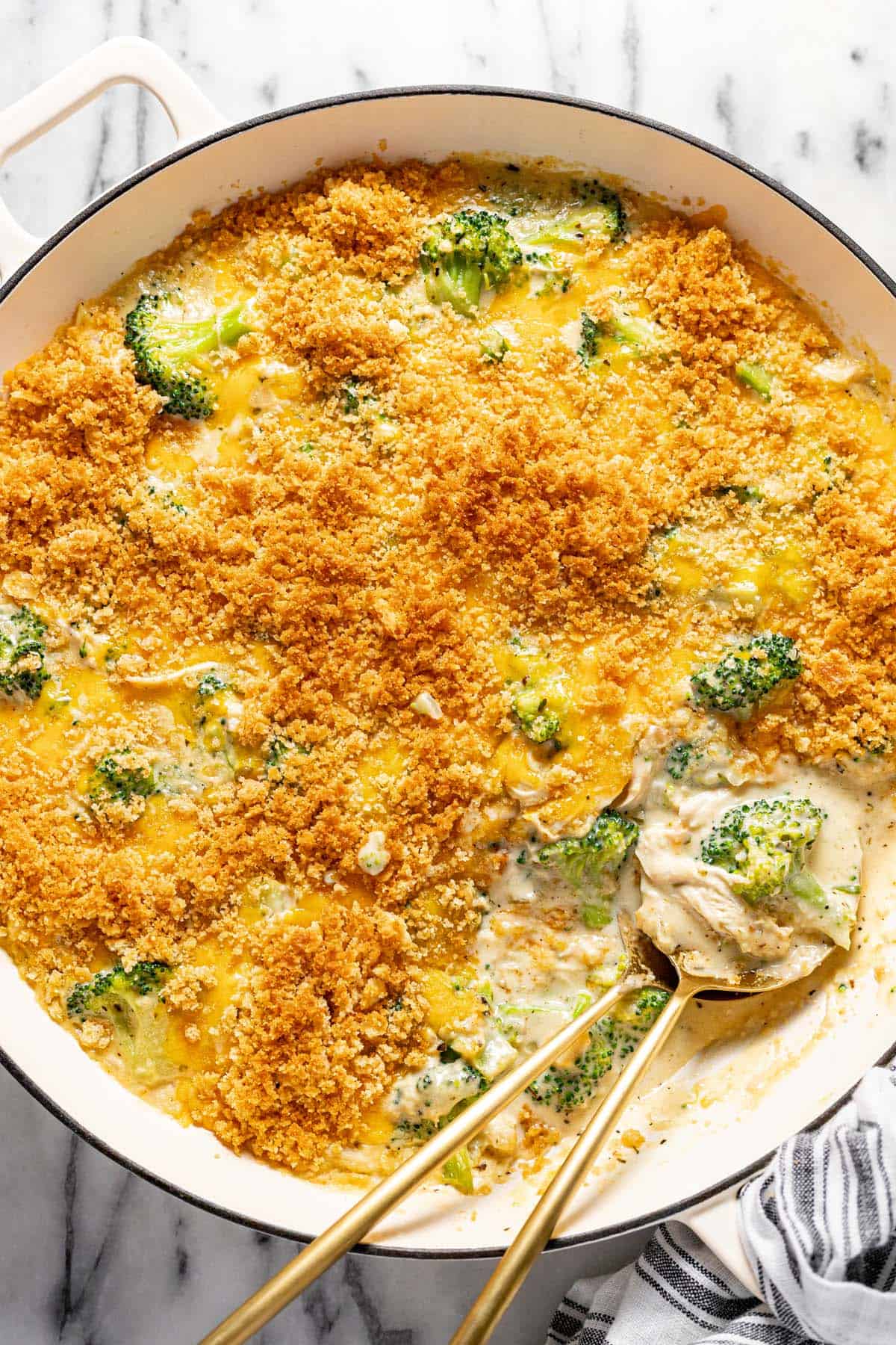 Large pan filled with homemade creamy chicken divan. 