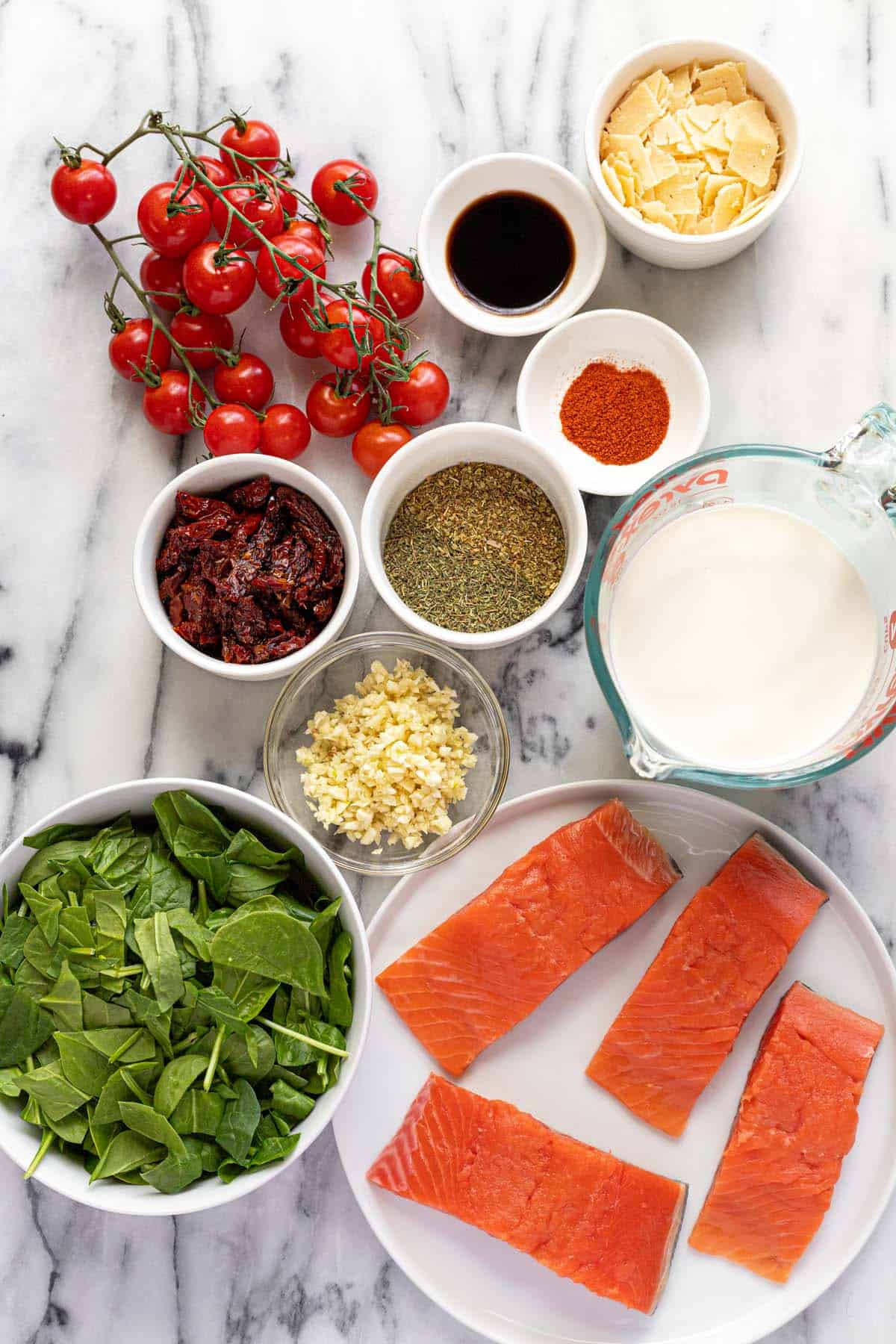 Bowls of ingredients to make Tusacn salmon.