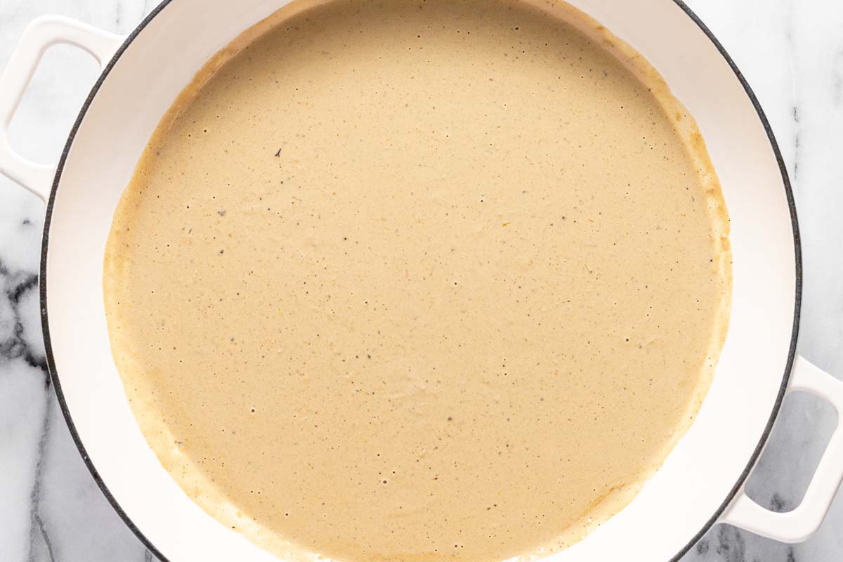 Large pan filled with lemon cream sauce. 