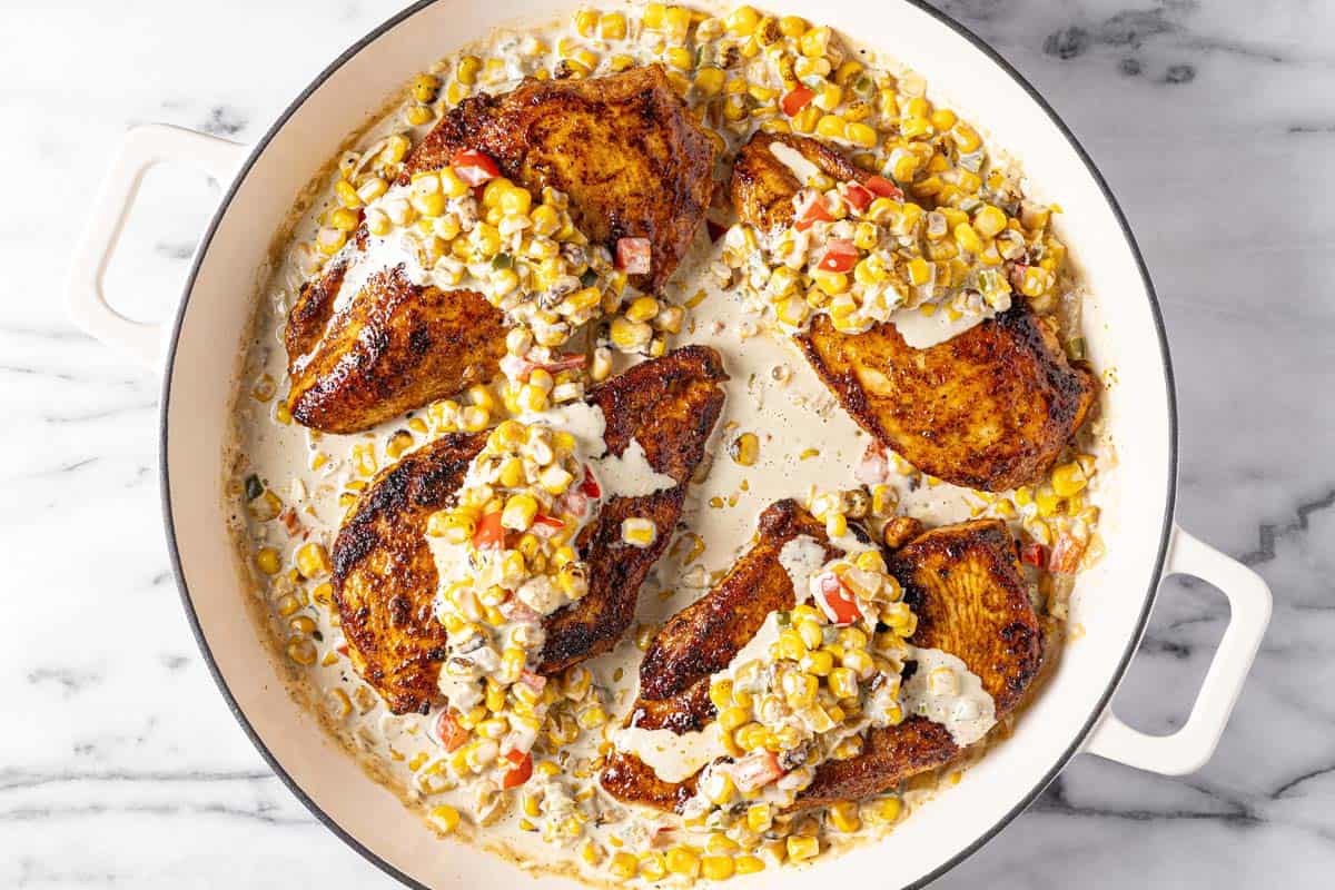 Sauteed chicken nestled in a creamy street corn sauce. 