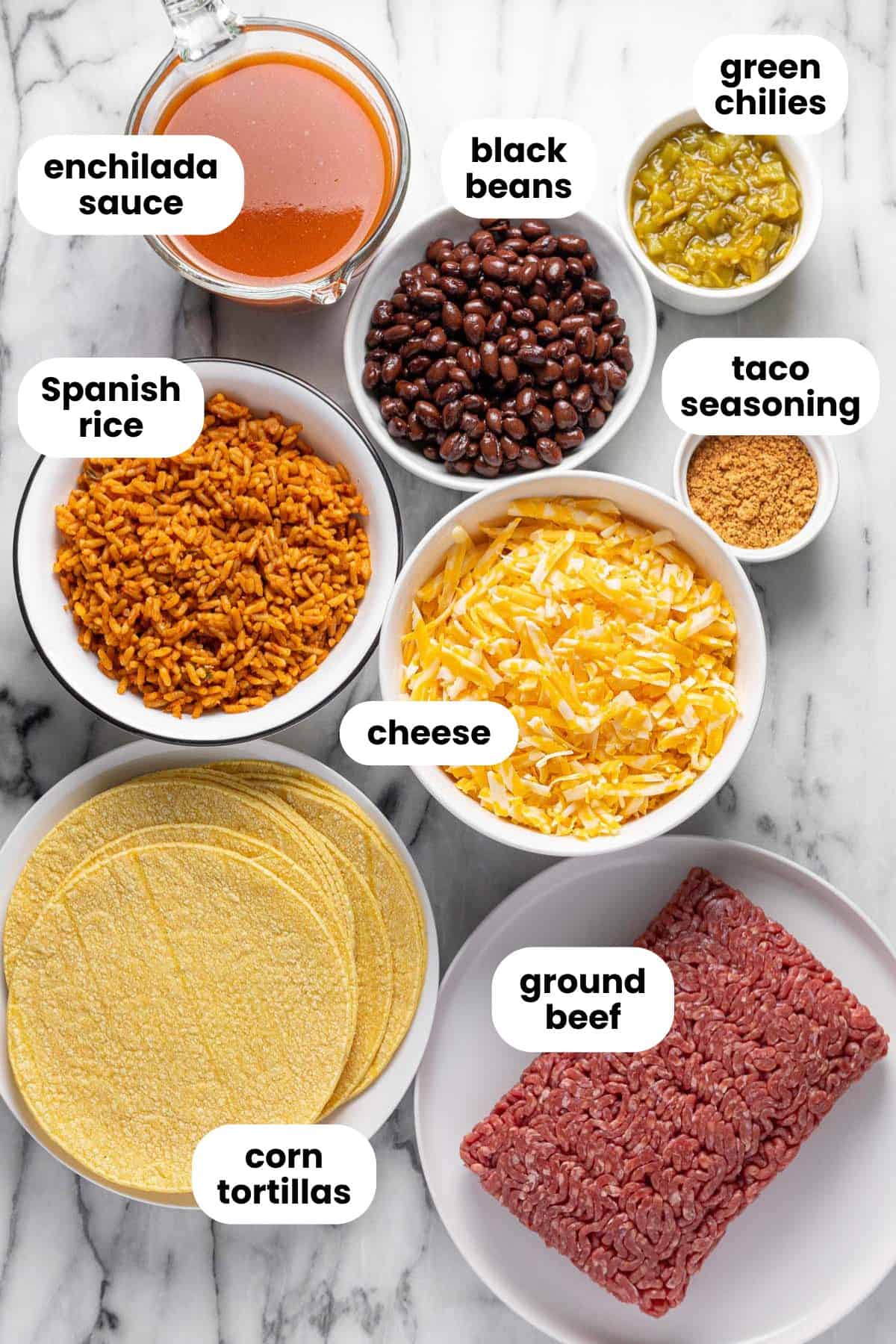 Bowls of ingredients to make homemade ground beef enchiladas. 