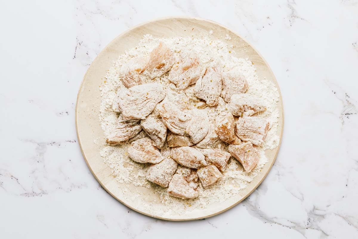 Chunks of chicken dredged in flour and seasonings. 