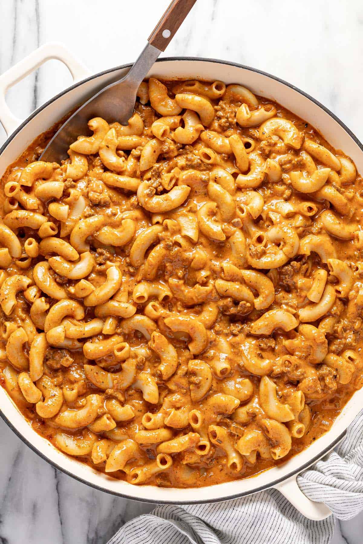 Large pan filled with homemade beefaroni. 