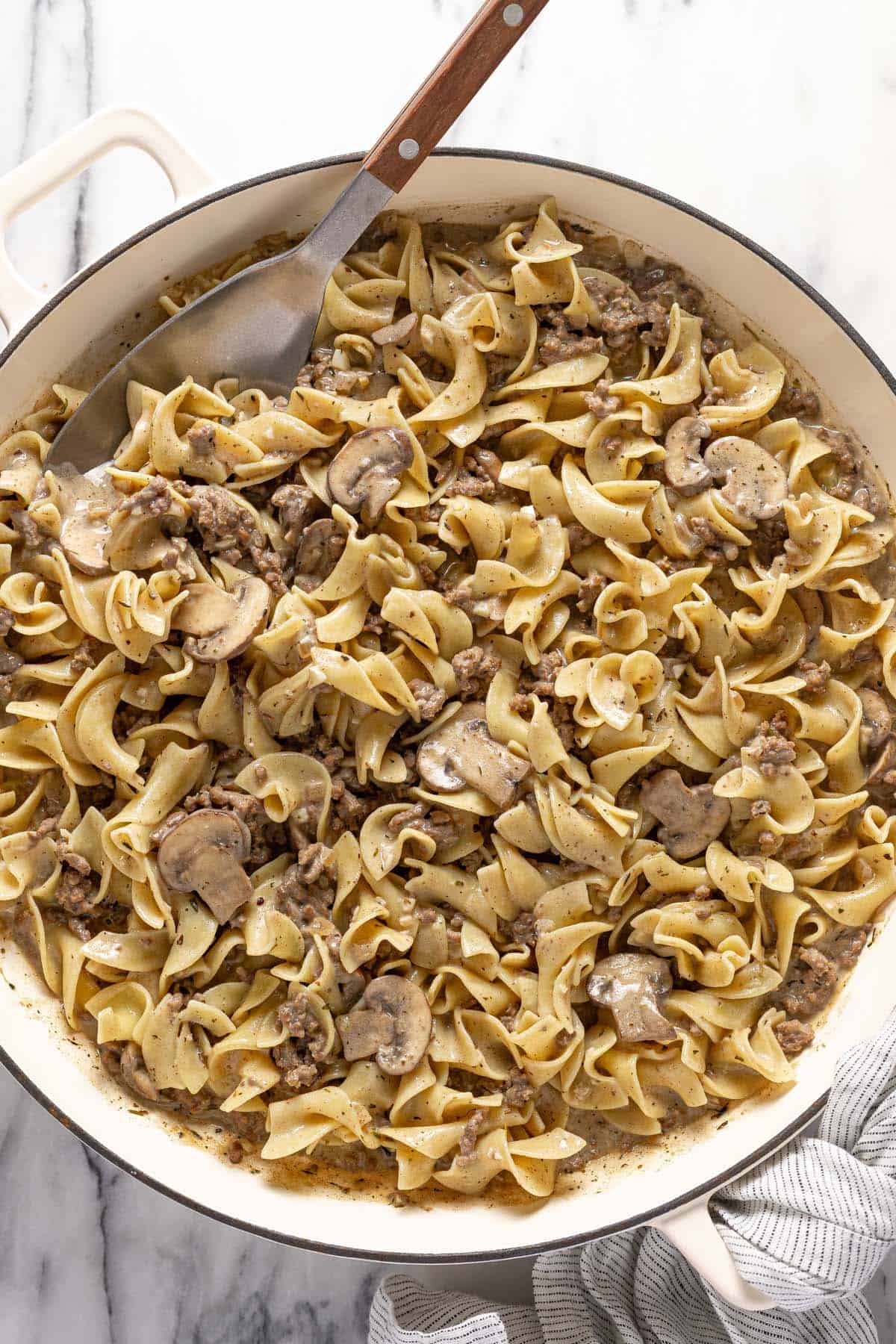 Large pan of ground beef stroganoff with mushrooms. 