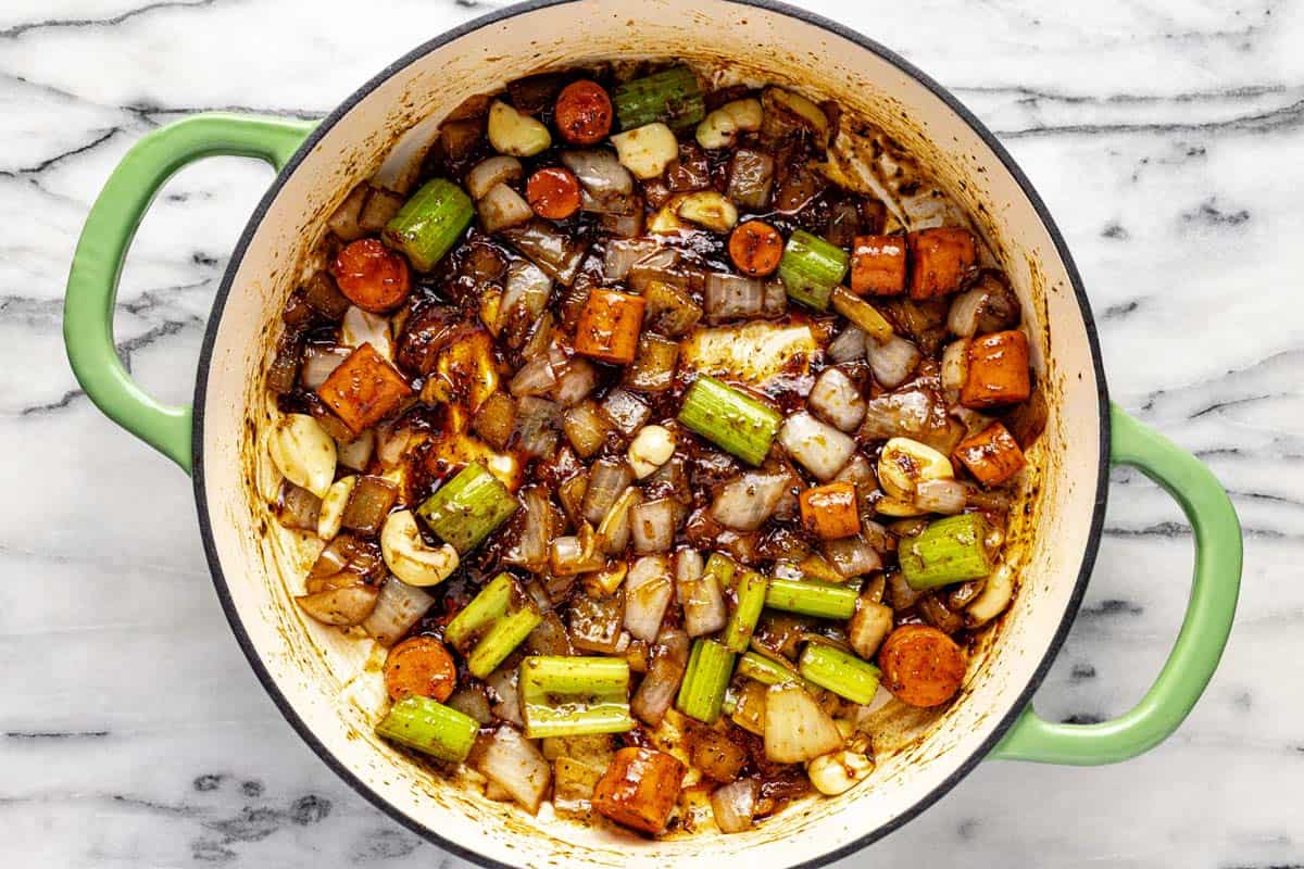 Sauteed veggies and garlic in a large pot. 