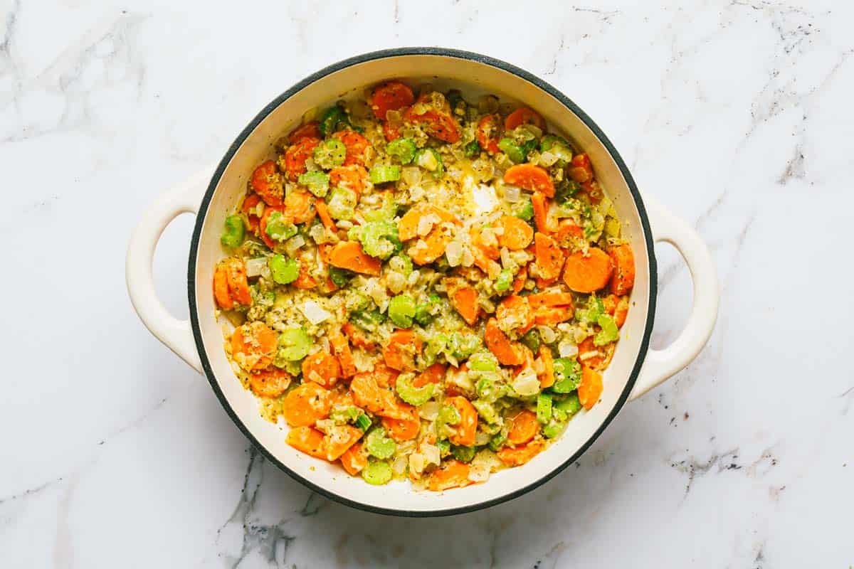 Sauteed veggies in a roux in a large pot. 