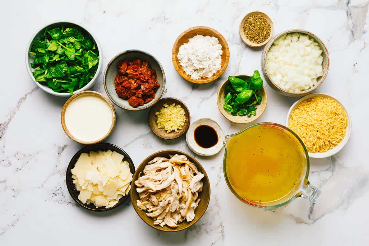 Bowls of ingredients to make marry me chicken soup. 