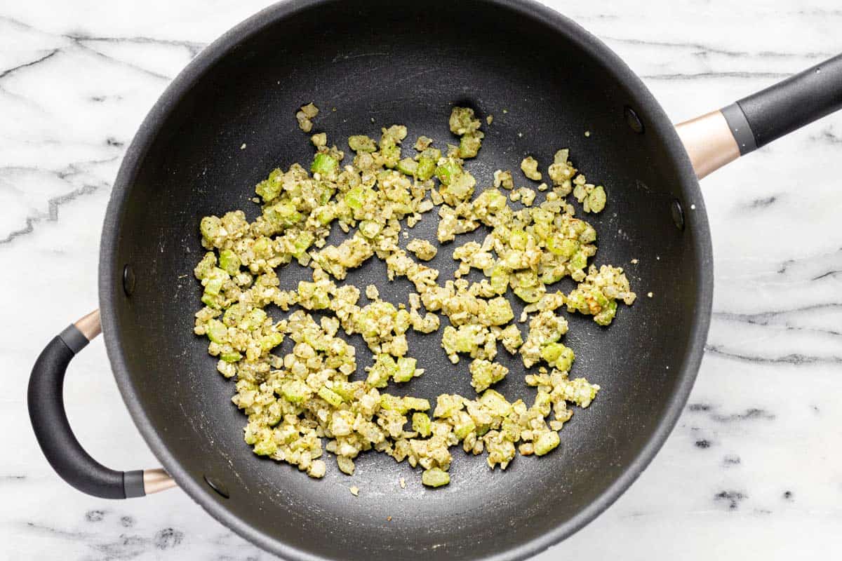 Large pan with sauteed veggies, butter, and flour. 