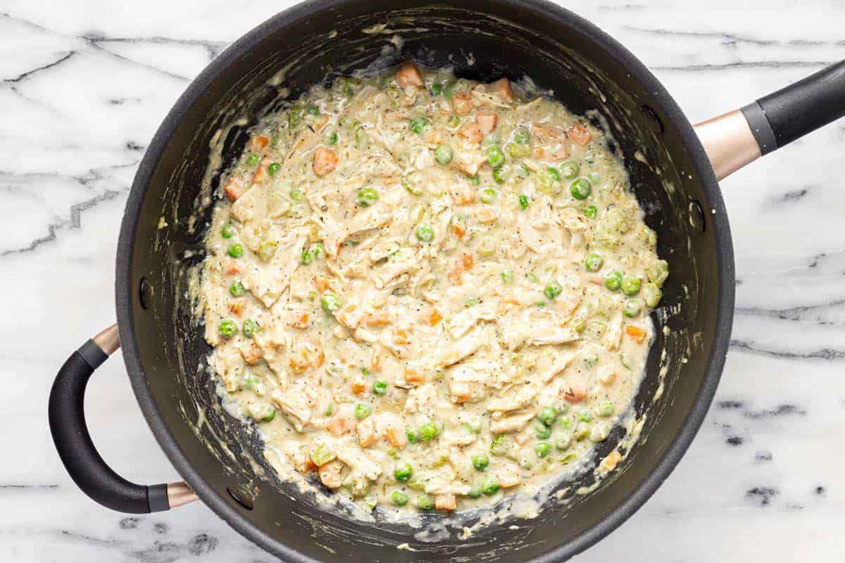 Pot pie filling in a large pan. 