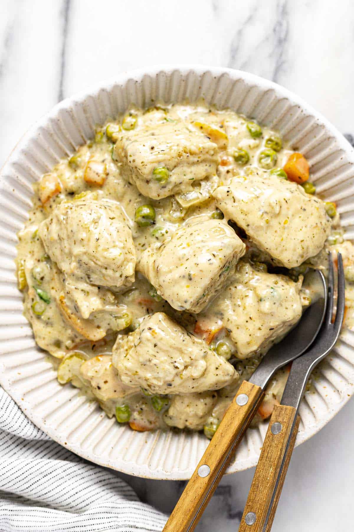 Bowl of crock pot chicken and dumplings. 