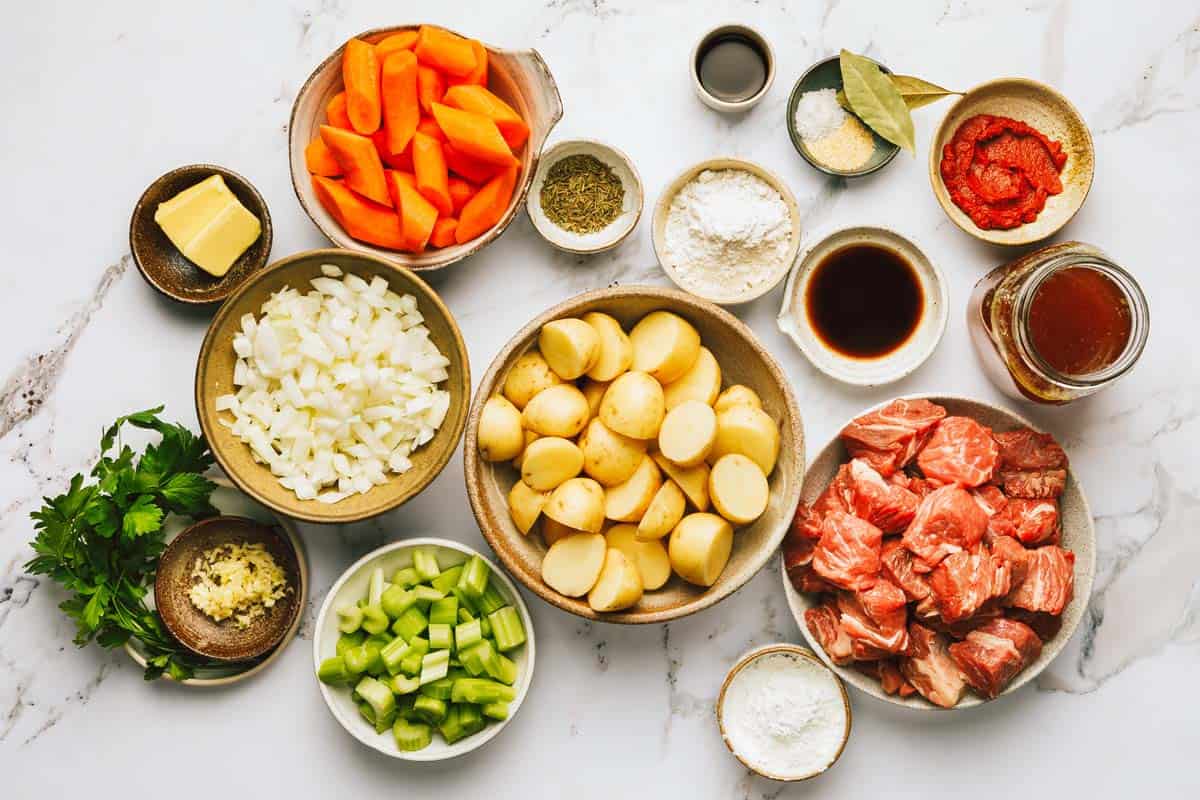 Bowls of ingredients to make Dutch oven beef stew. 