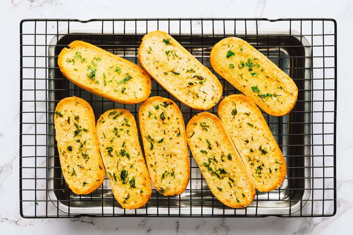 Toasted hoagie bread with homemade garlic butter on it. 