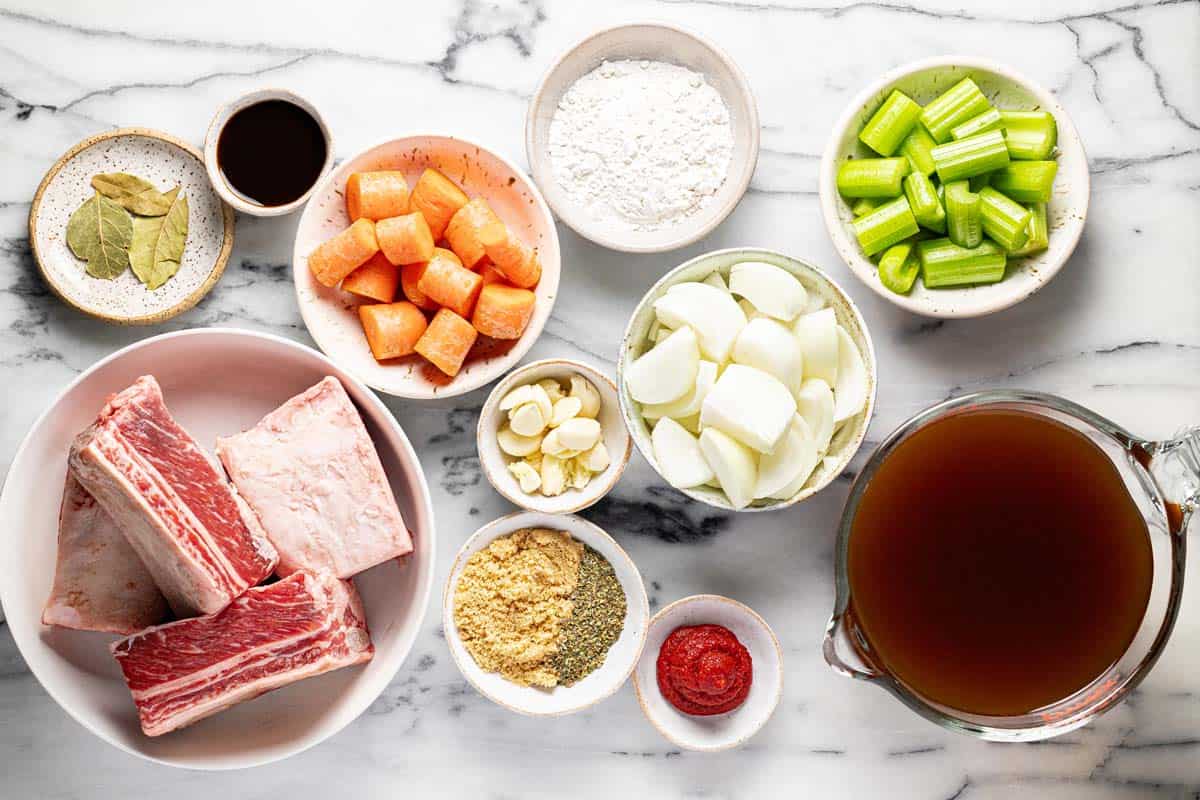 Bowls of ingredients to make braised beef short ribs. 