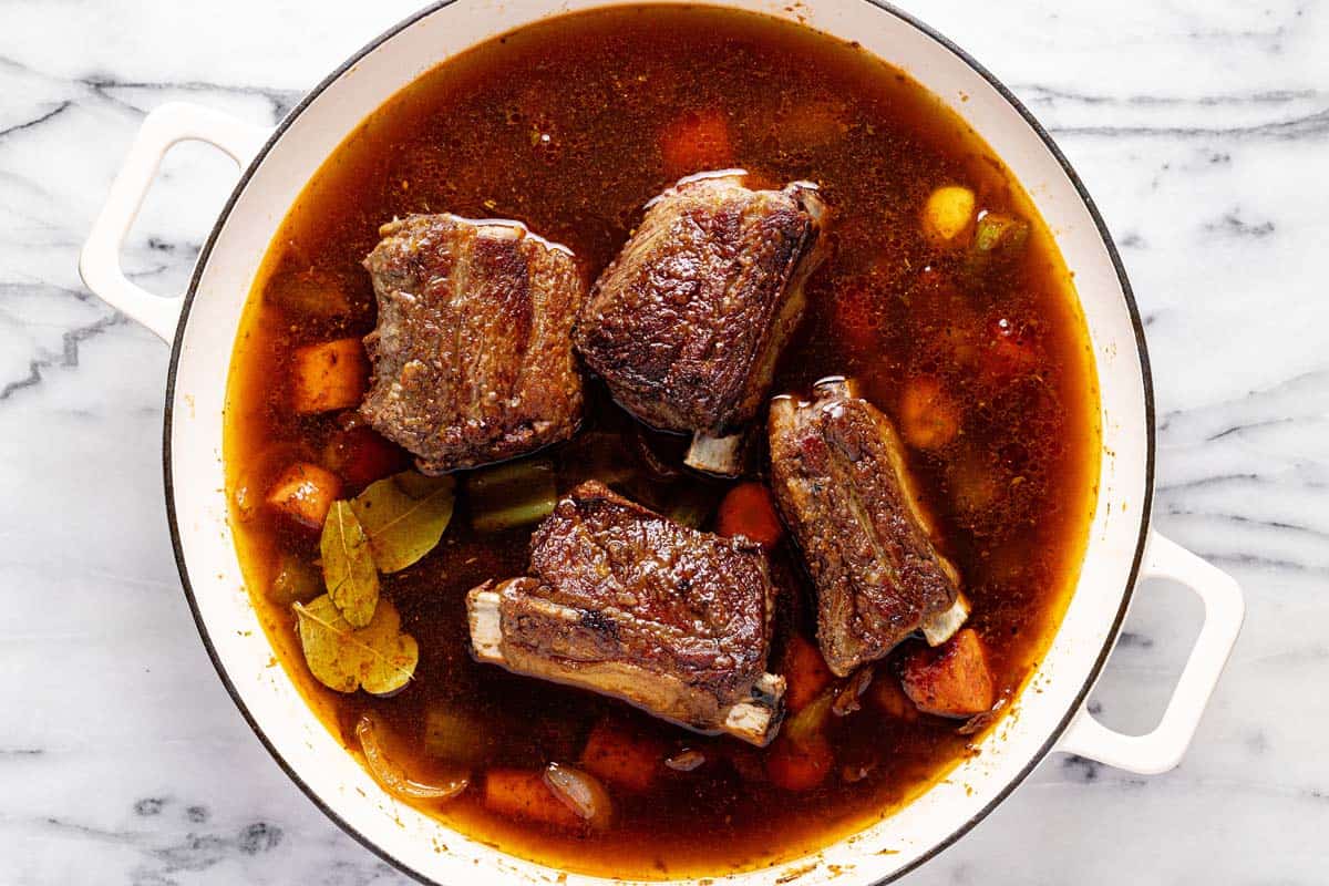 Seared short ribs and sauteed veggies in beef stock. 