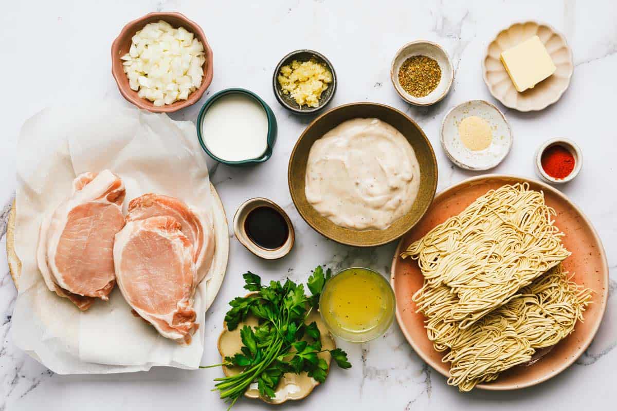 Bowls of ingredients to make pork chops with cream of mushroom soup. 