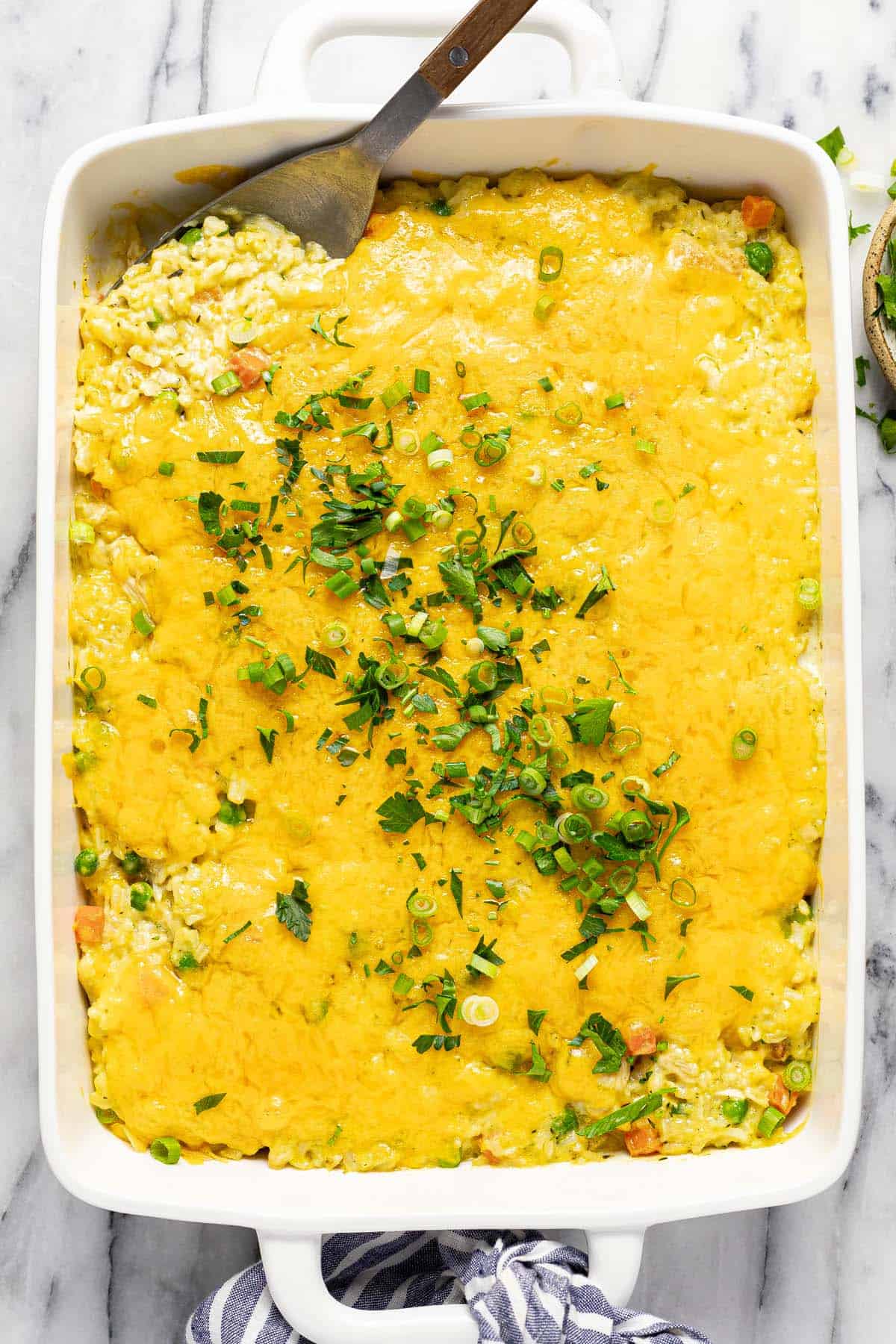 Large baking dish filled with chicken and rice casserole. 