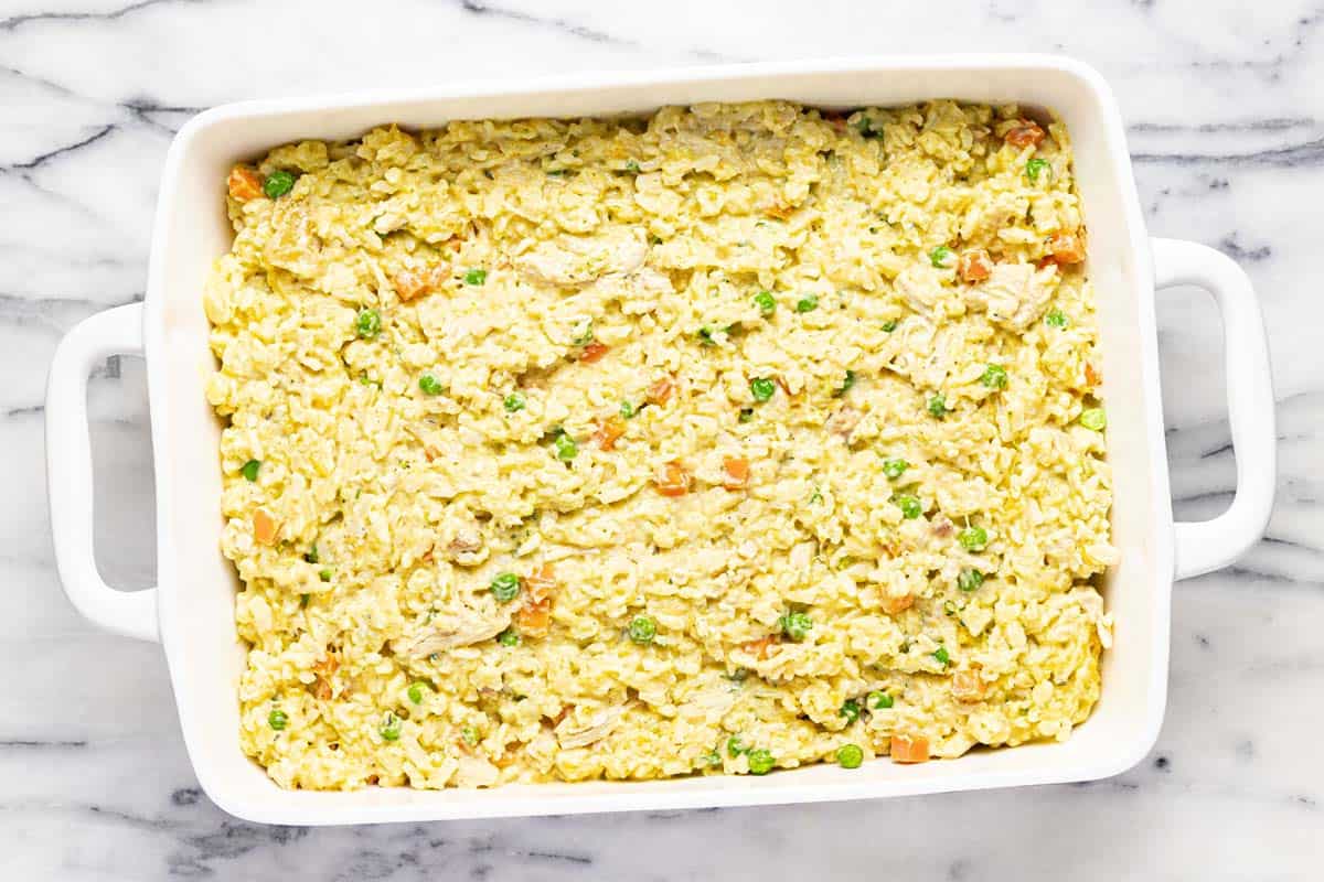 Cooked chicken and rice casserole in a baking dish. 