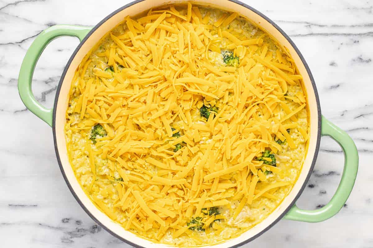 Shredded cheese on top of chicken broccoli casserole.