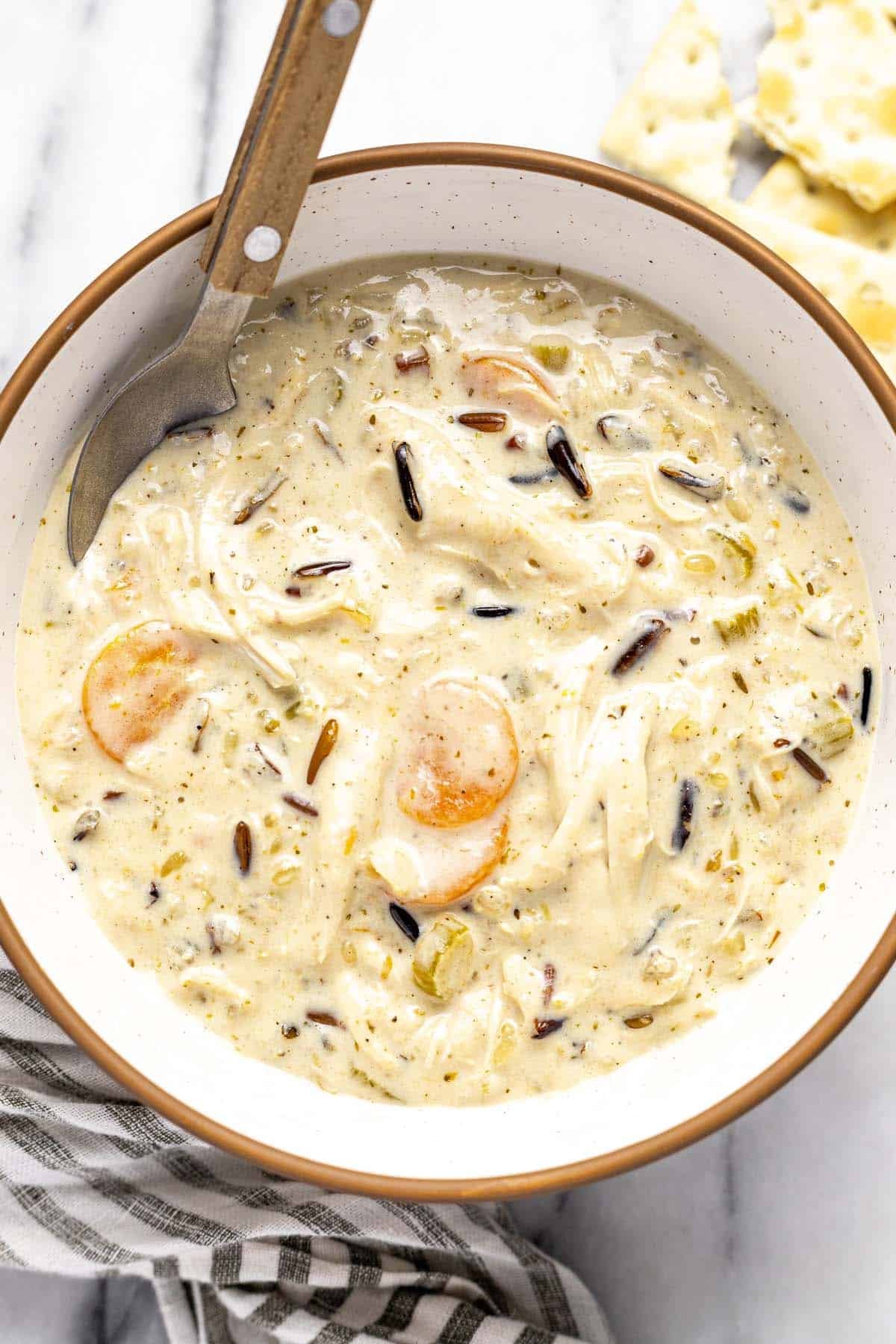 Bowl of creamy homemade chicken wild rice soup. 