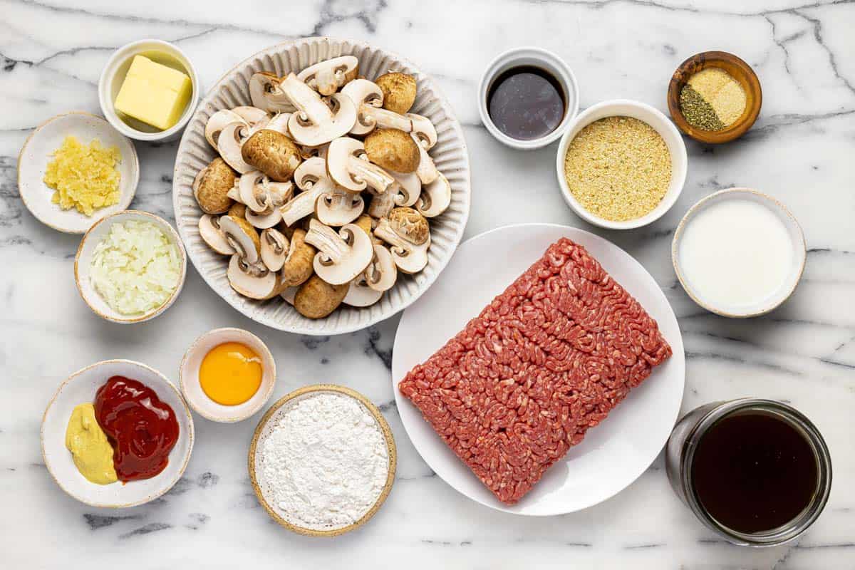 Bowls of ingredients to make Salisbury steak. 