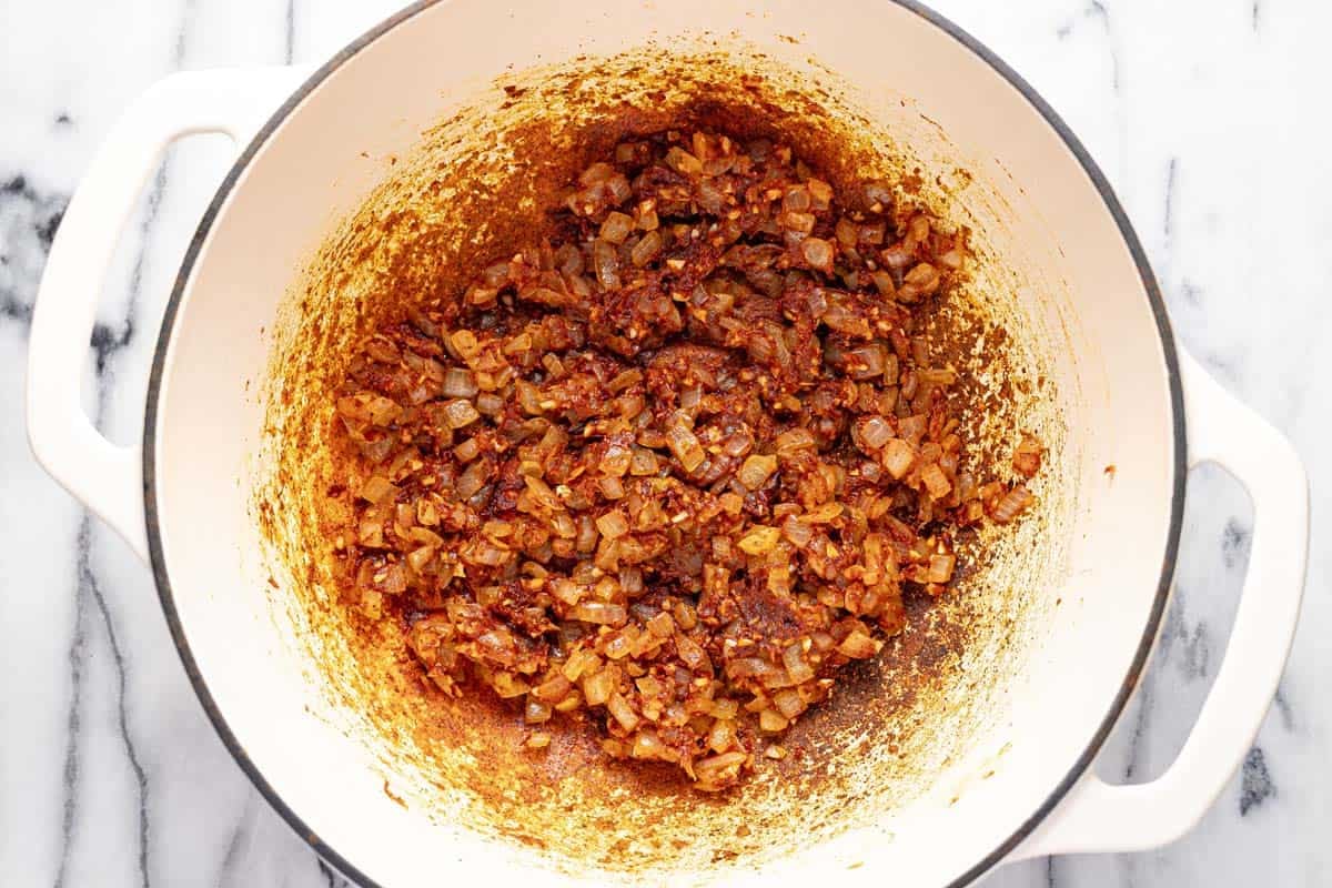 Sauteed onion, garlic, tomato paste, and taco seasoning in a large pot. 