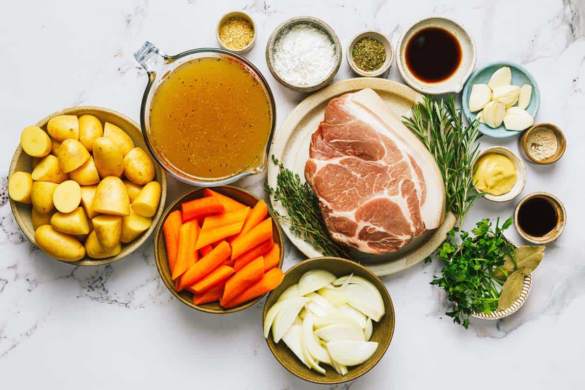 Bowls of ingredients to make slow cooker pork roast. 