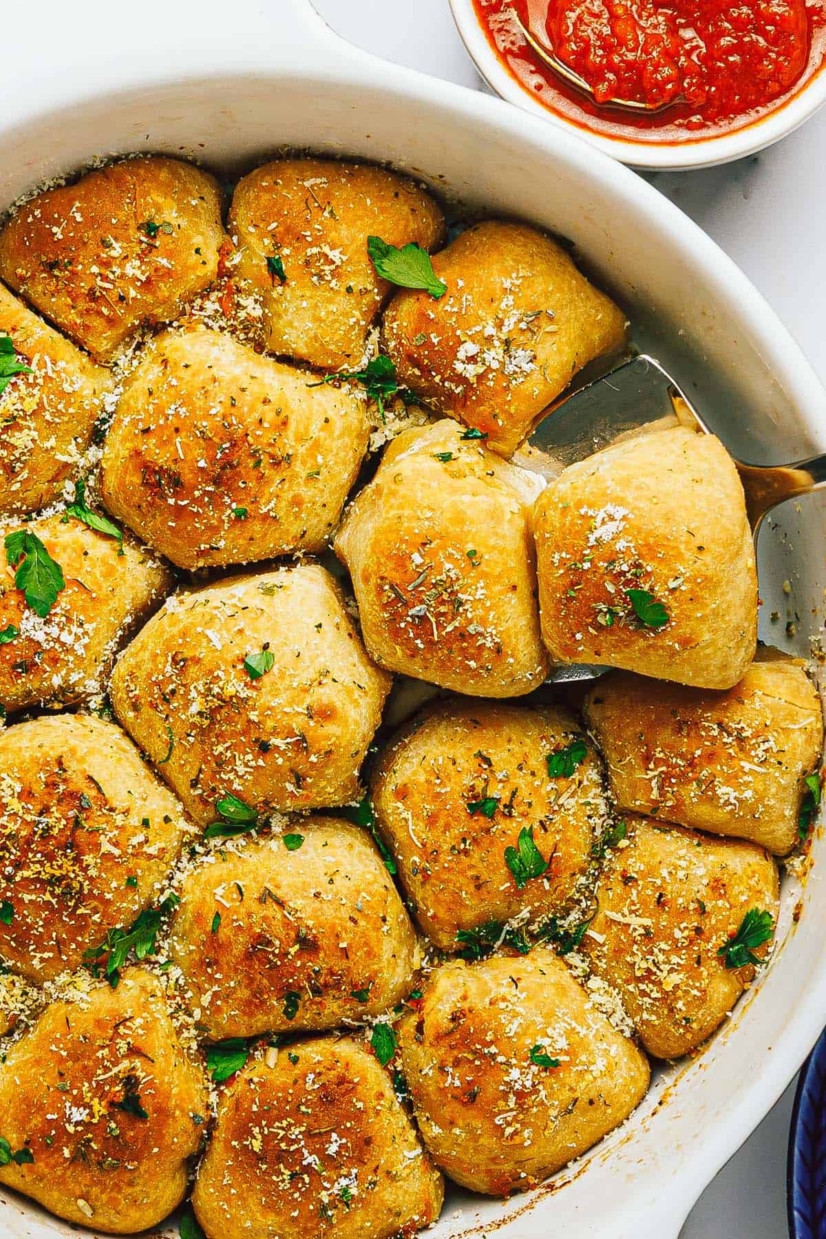 Close up shot of pizza bites in a large pan. 