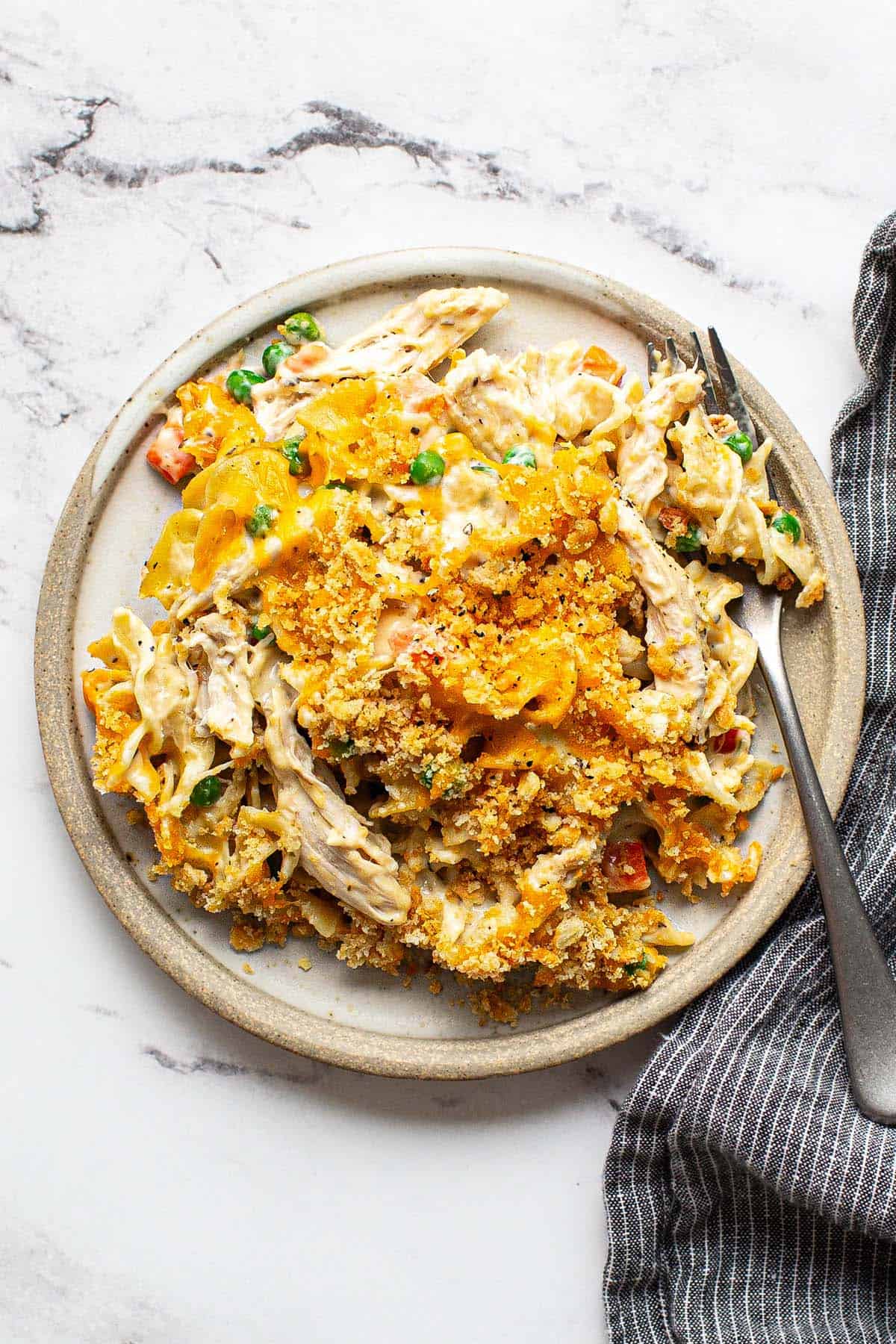 Plate of chicken noodle casserole with a fork. 