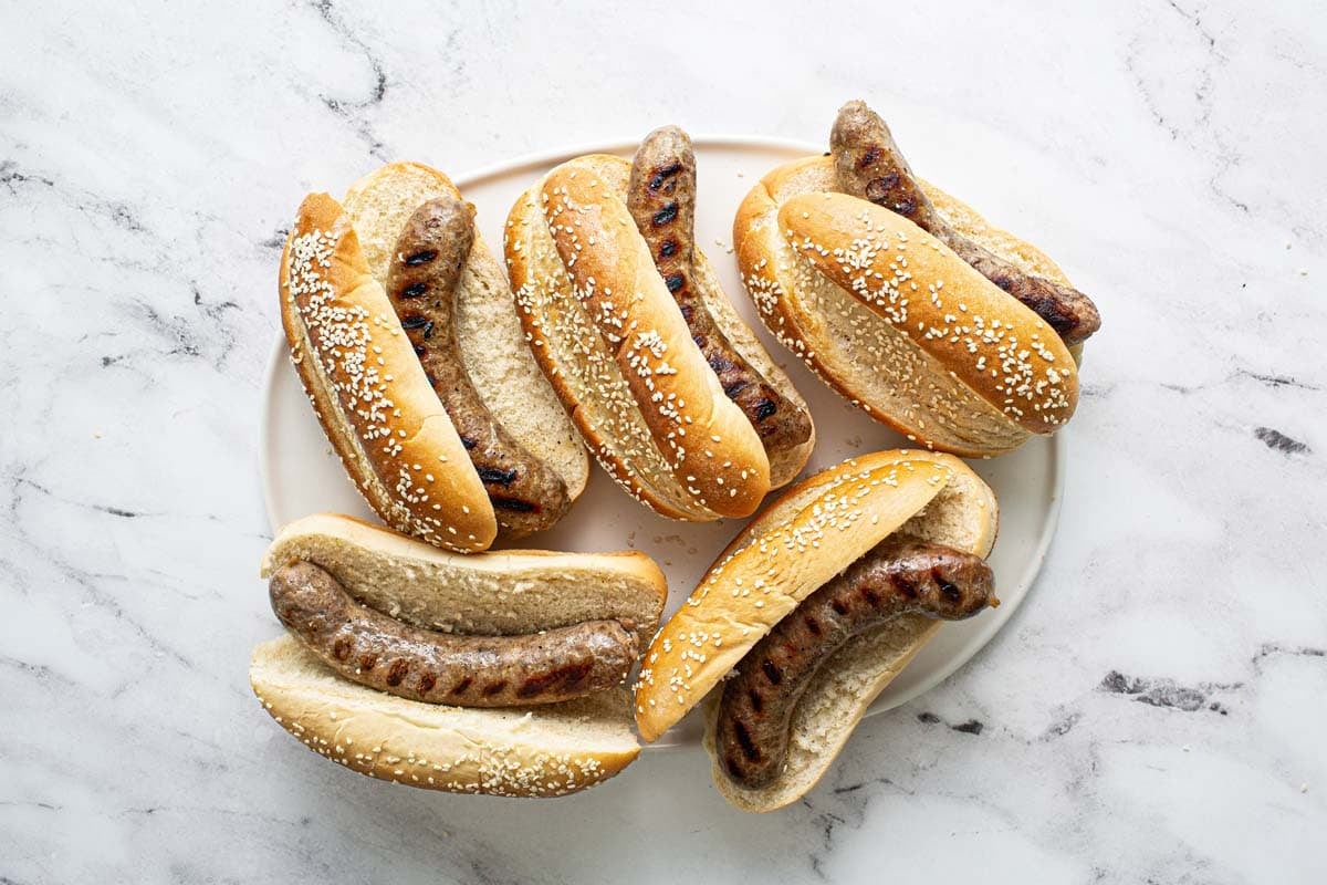 Large serving platter with Wisconsin grilled brats. 