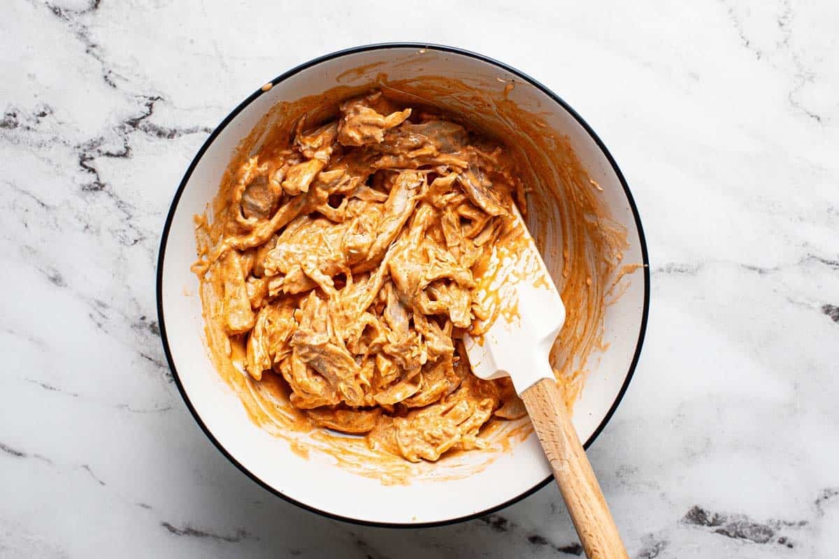 Shredded chicken tossed in buffalo sauce and ranch dressing. 