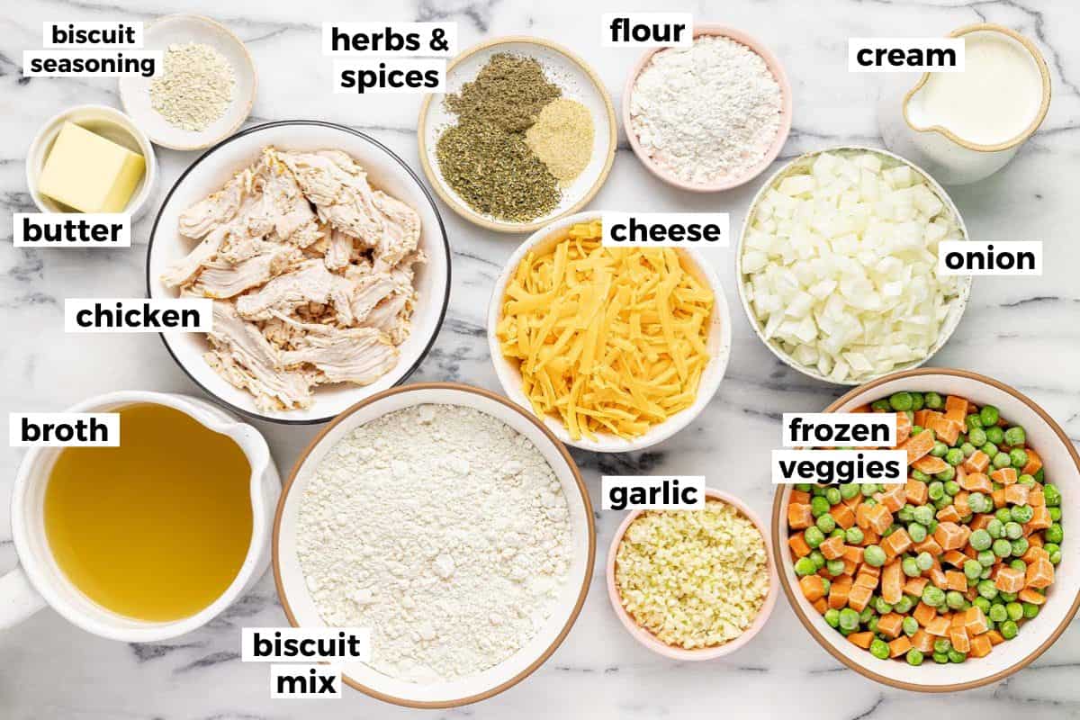 Bowls of ingredients to make chicken cobbler. 