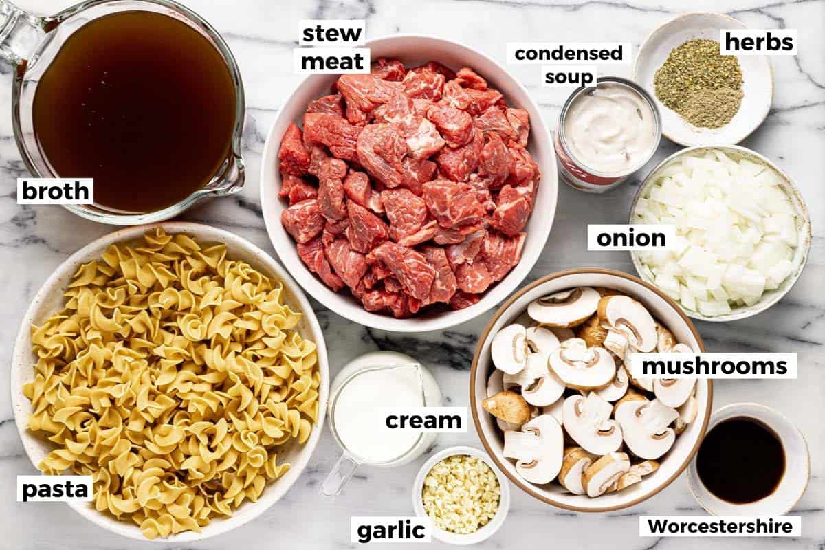 Bowls of ingredients to make slow cooker beef and noodles. 
