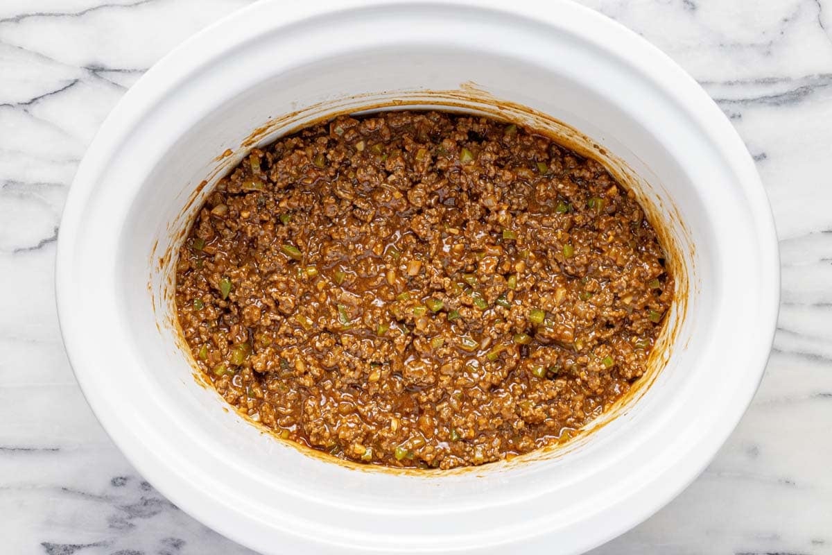 All ingredients to for sloppy joes mixed together in a crock pot. 