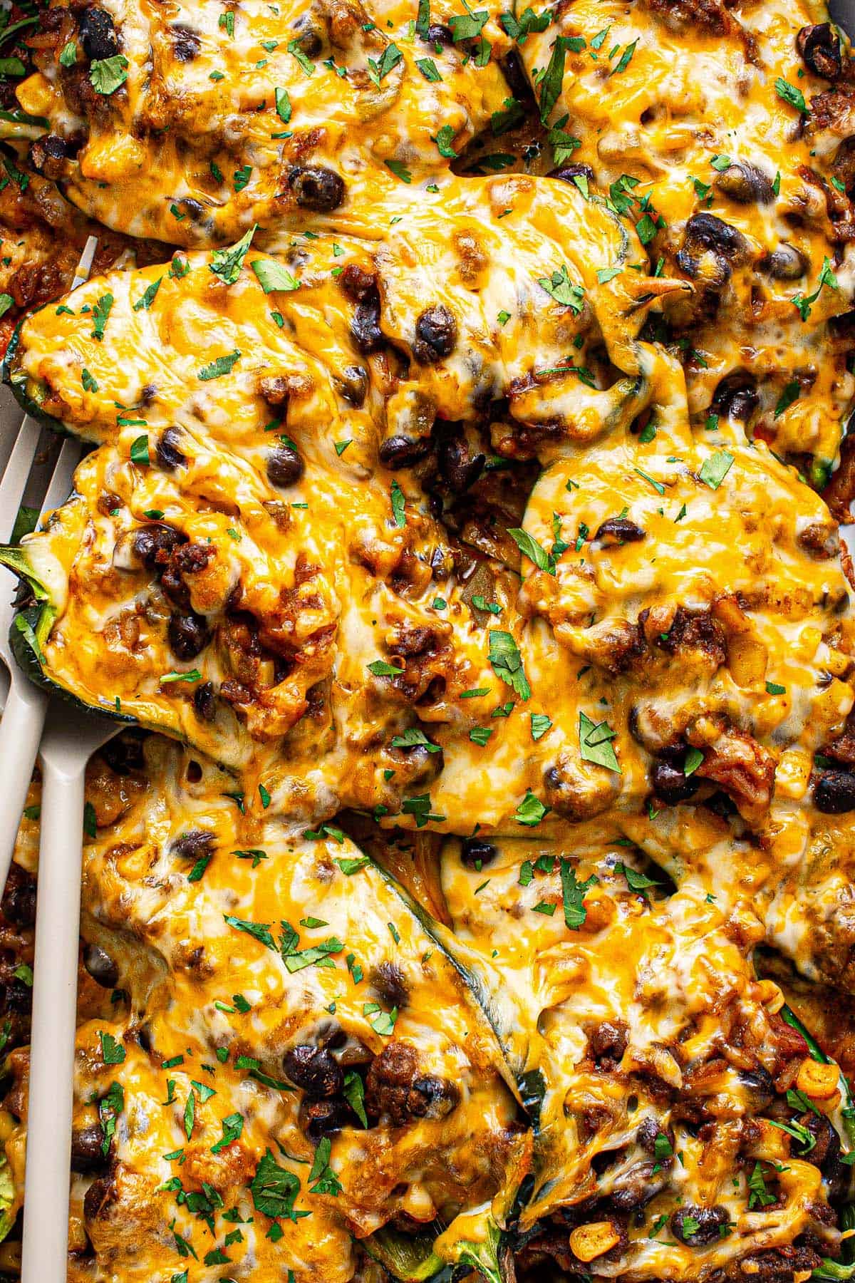 Close up shot of taco stuffed poblano peppers. 