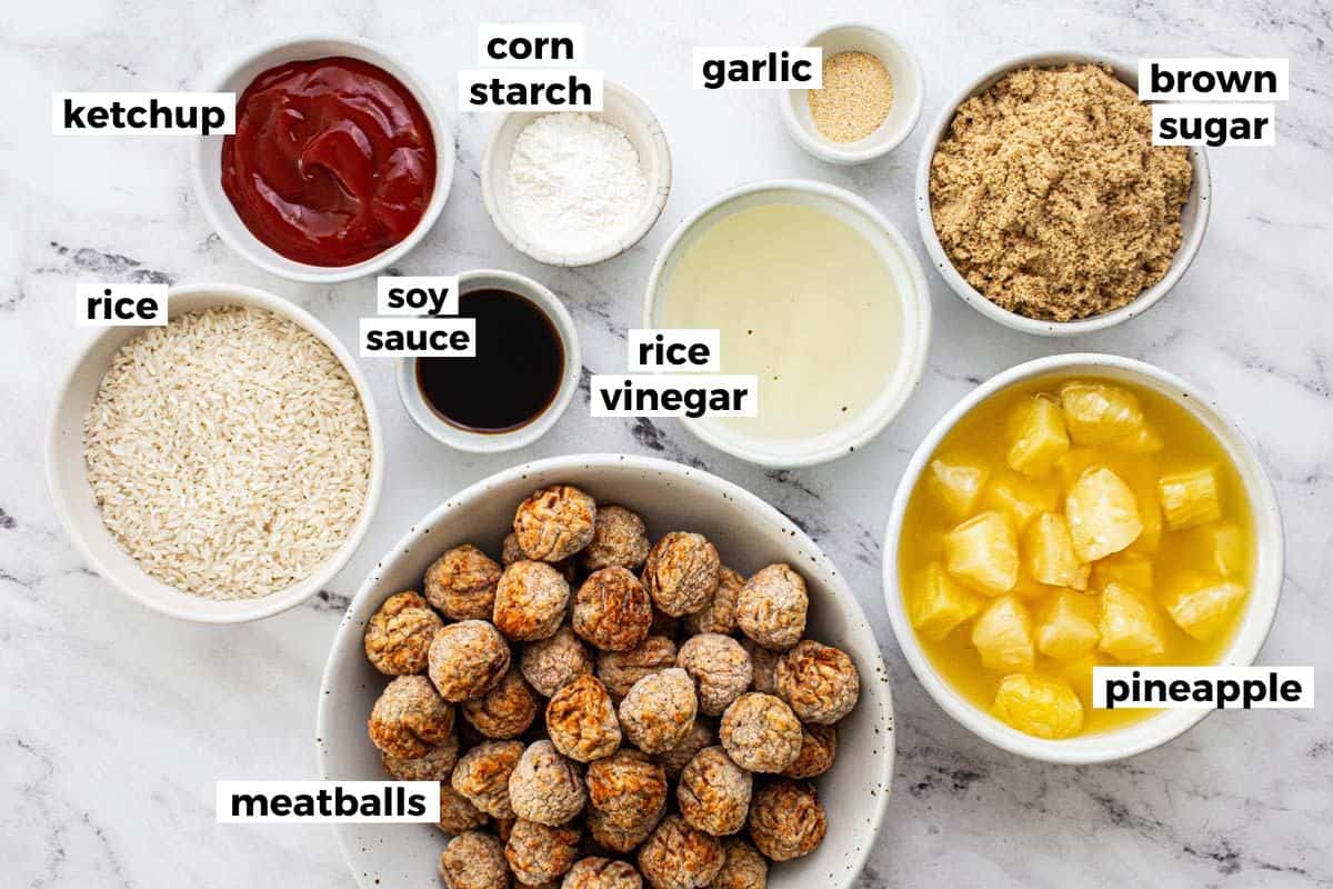 Bowls of ingredients to make sweet and sour meatballs. 