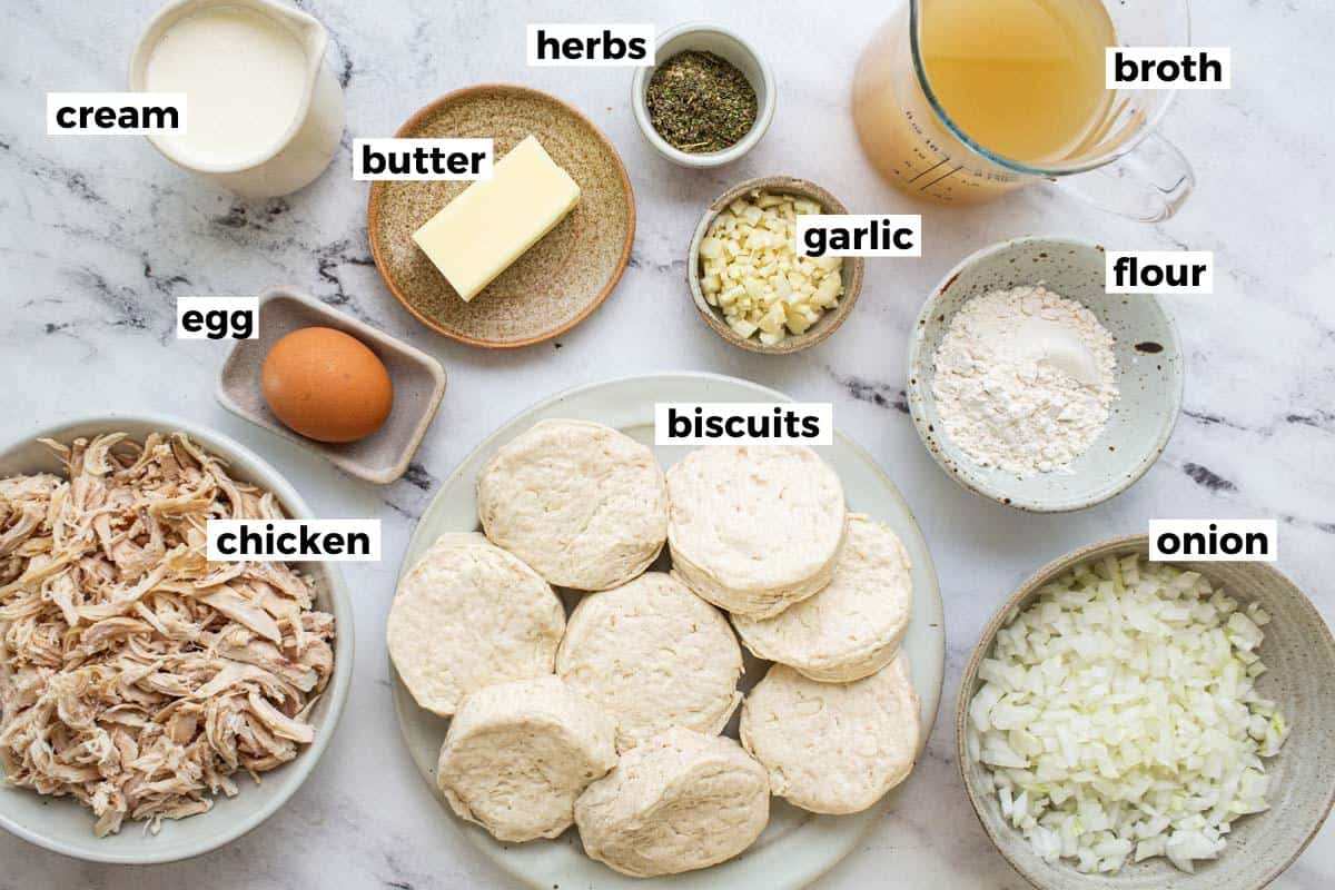 Bowls of ingredients to make chicken and biscuits. 