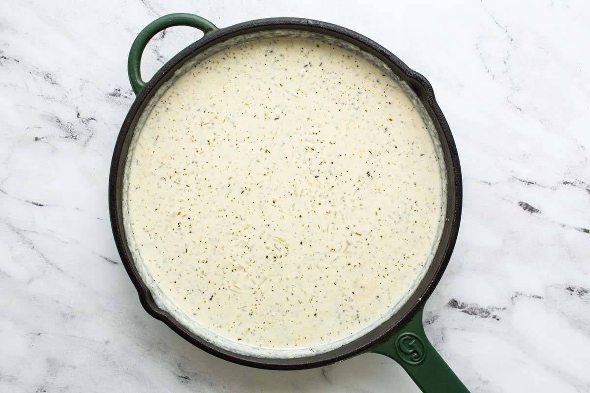 Creamy chicken and biscuits sauce in a pan. 