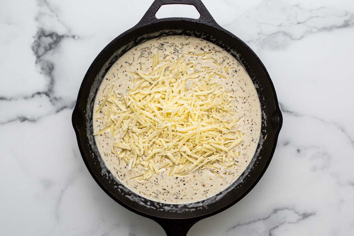Garlic cream sauce with Parmesan cheese added. 