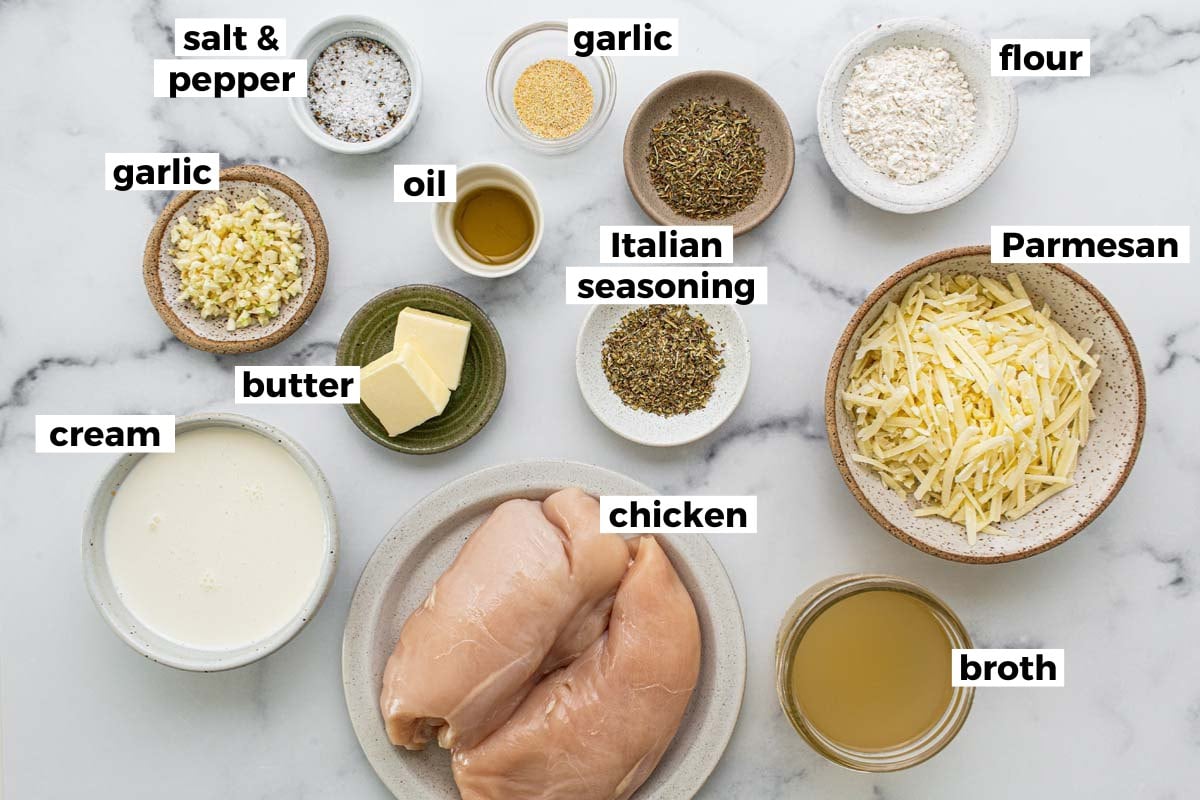 Bowls of ingredients to make garlic and Parmesan chicken. 