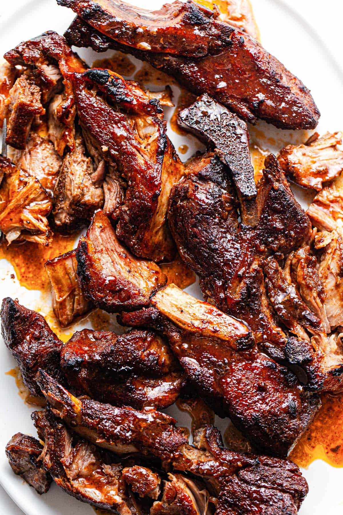 Close up shot of a platter with country style BBQ ribs. 